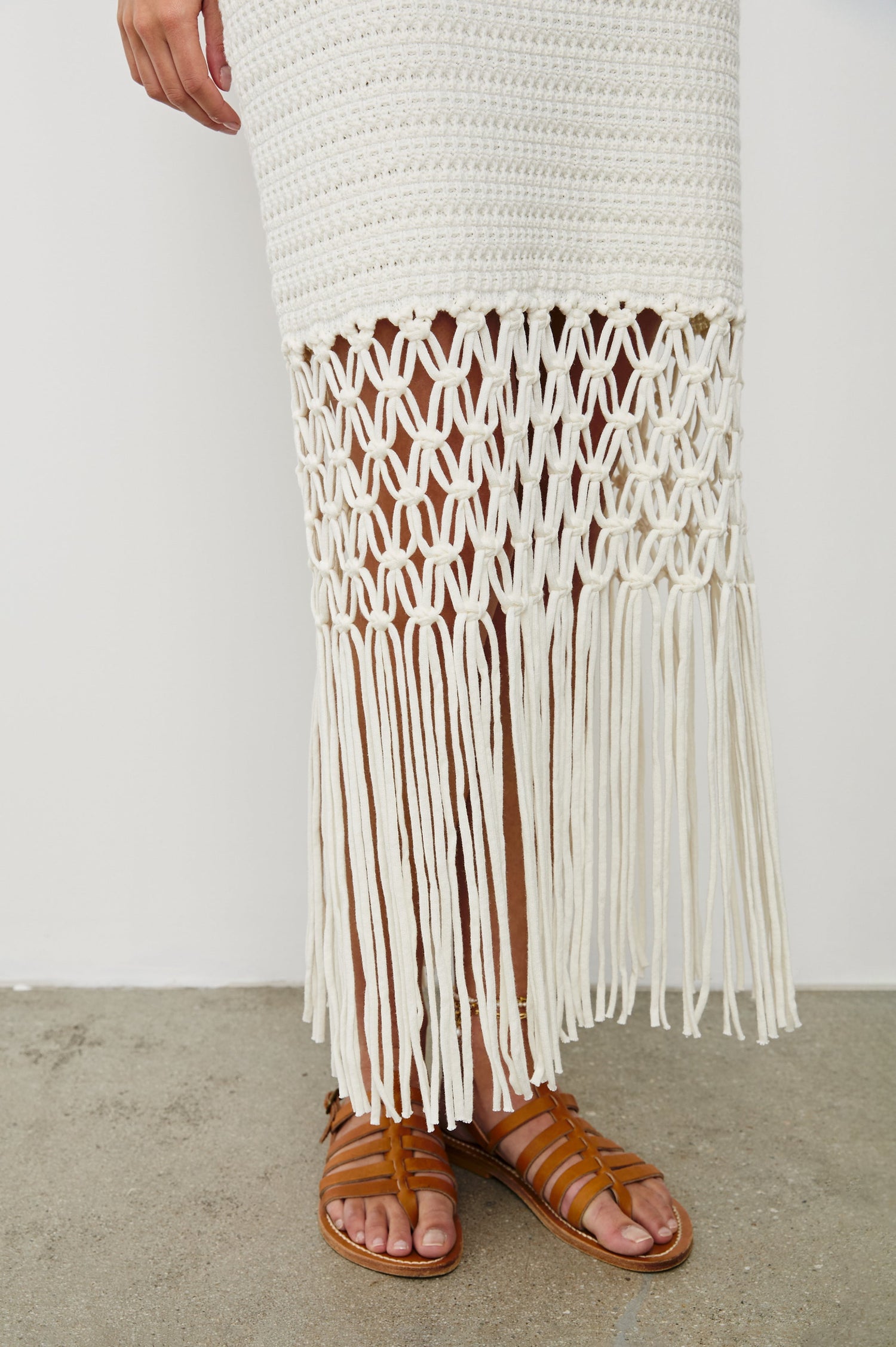 Sevilla Pull On Midi Skirt with Elastic Waistband, Straight Fit, Lattice and Fringed Hem in White Colorway. Front Detailed View Shown on Model.