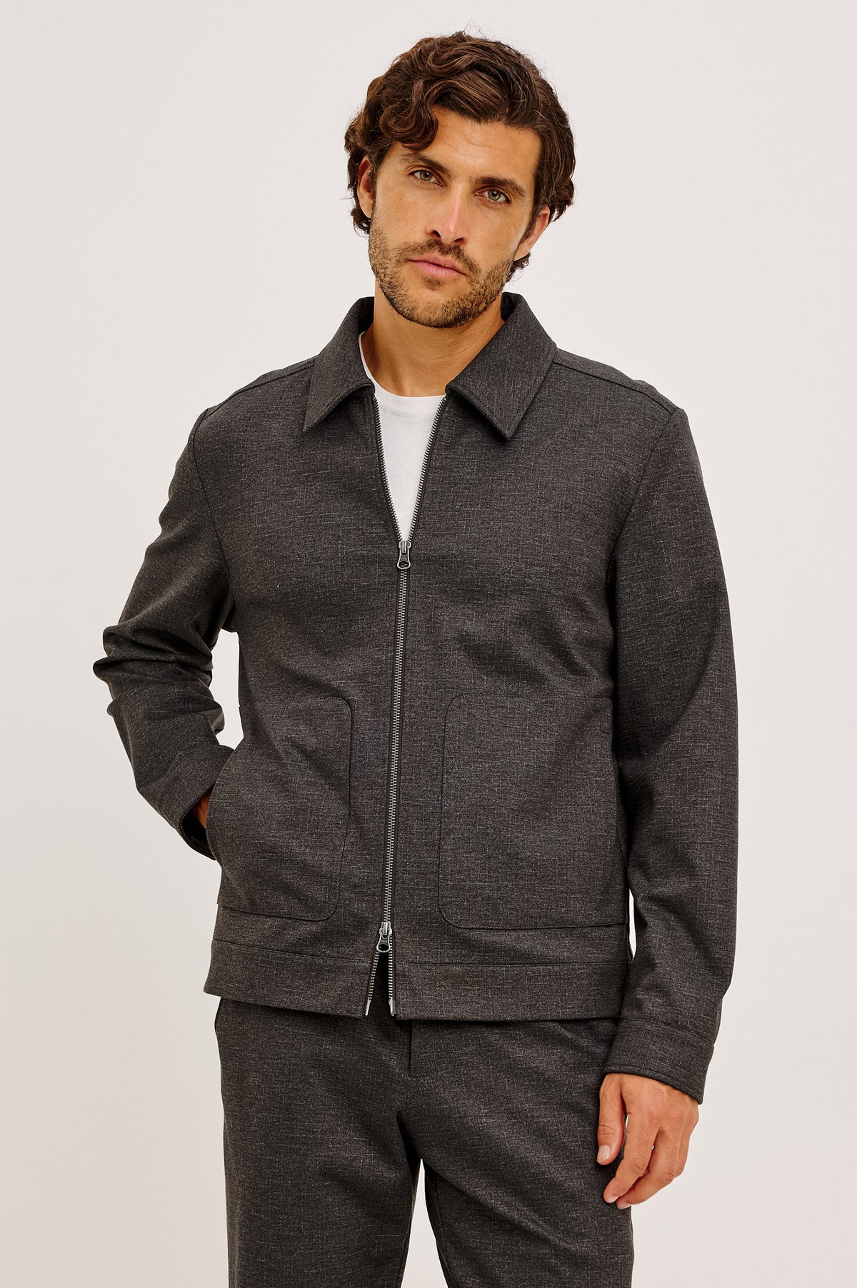Shael Jacket in Heathered Stretch Ponte With Point Collar, Zip Front, and Double Welt Pockets in Umber Colorway - Upper Body Front View Featured on Model