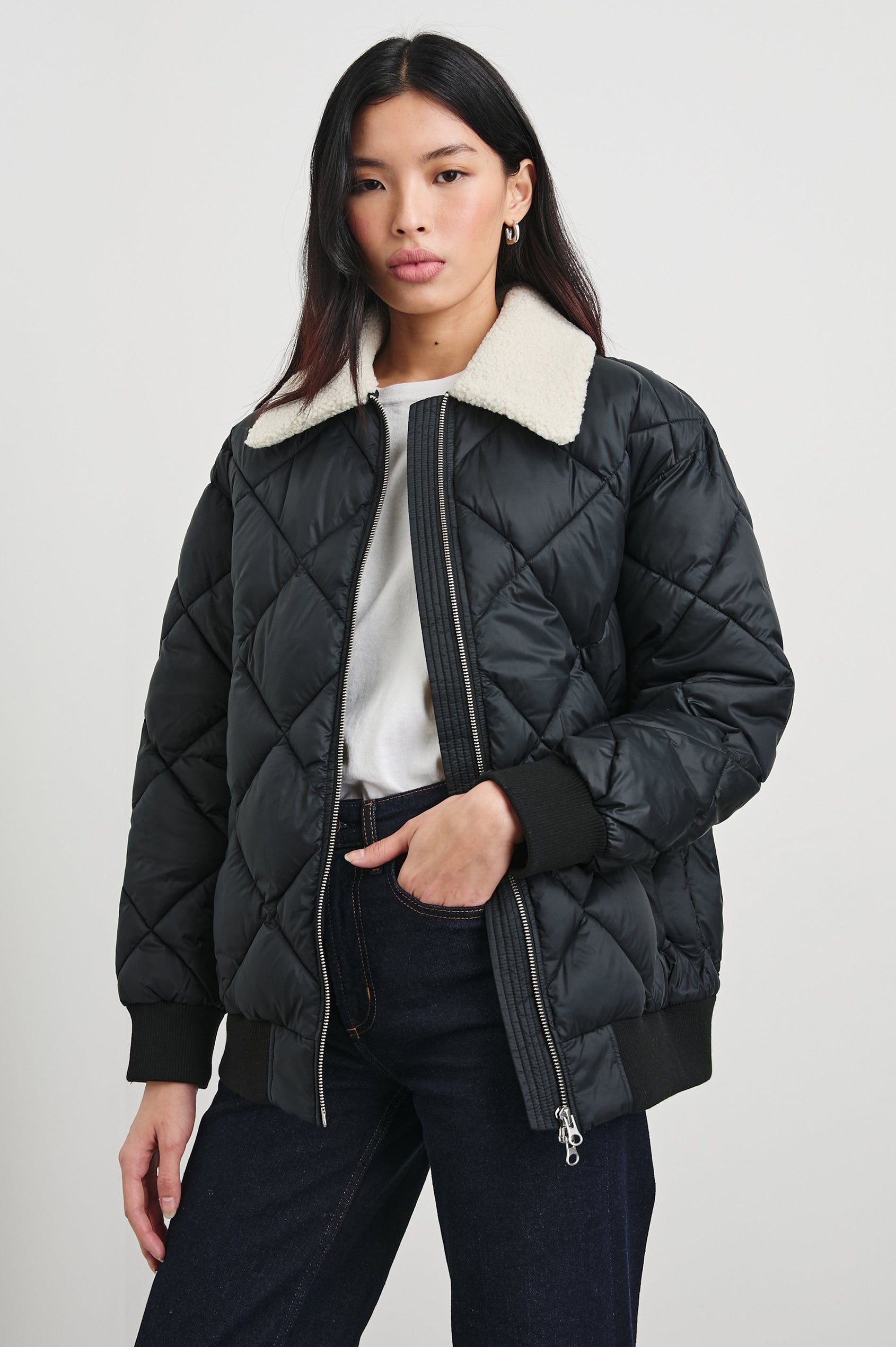 Shay Quilted Jacket with Zip Closure and a Cream Sherpa Collar in Black Colorway - Front View Featured on Model 