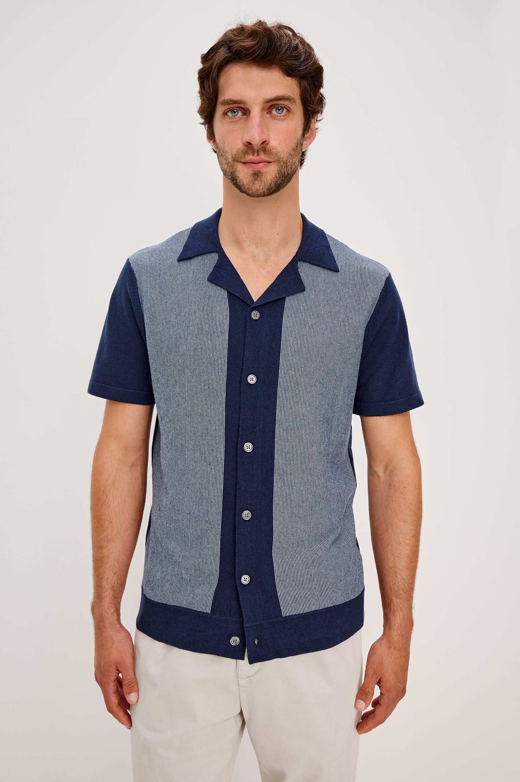 Silas short sleeve knit button down shirt with retro front striped design features in Navy Lagoon Stripe - front view on model