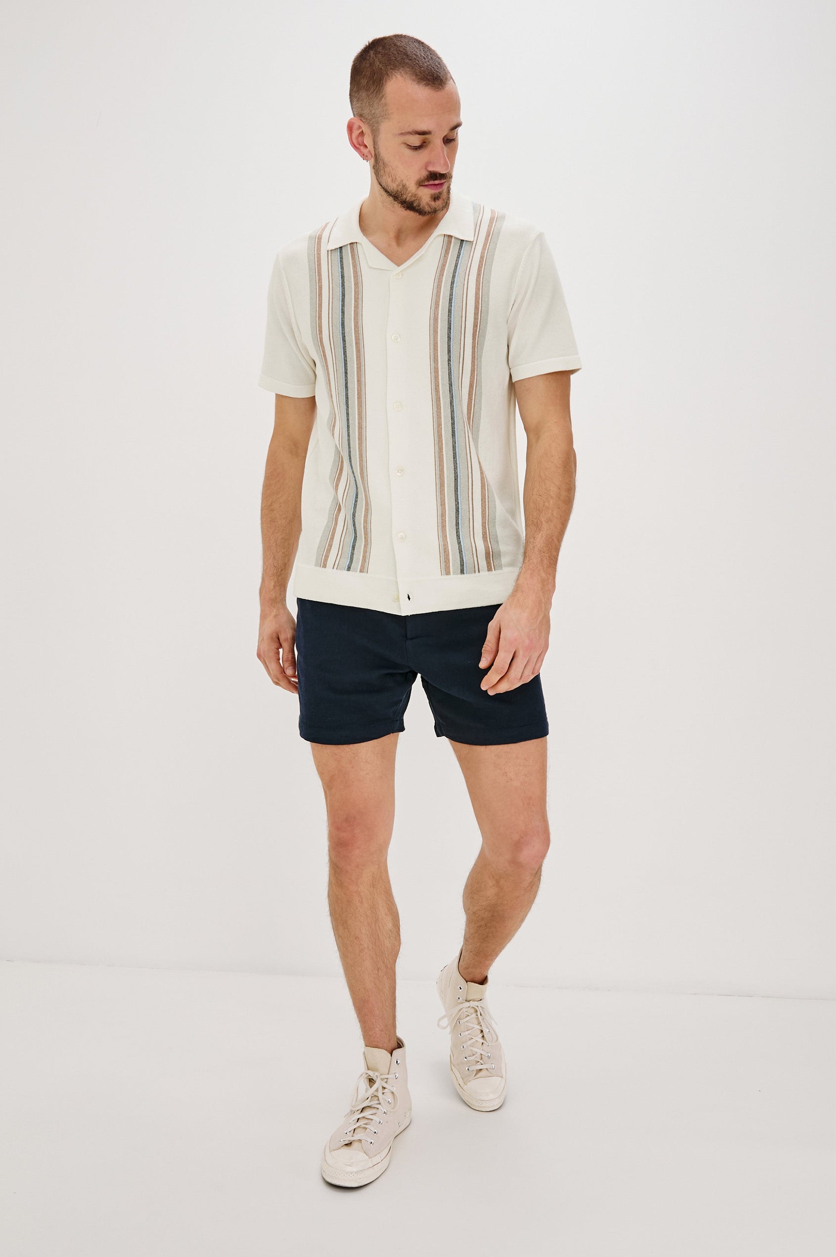Silas Short-Sleeve Button Up in White Multi Colorway, with two front sections of vertical stripes in Blues, brown and grey - Full Body Front View Featured on Model