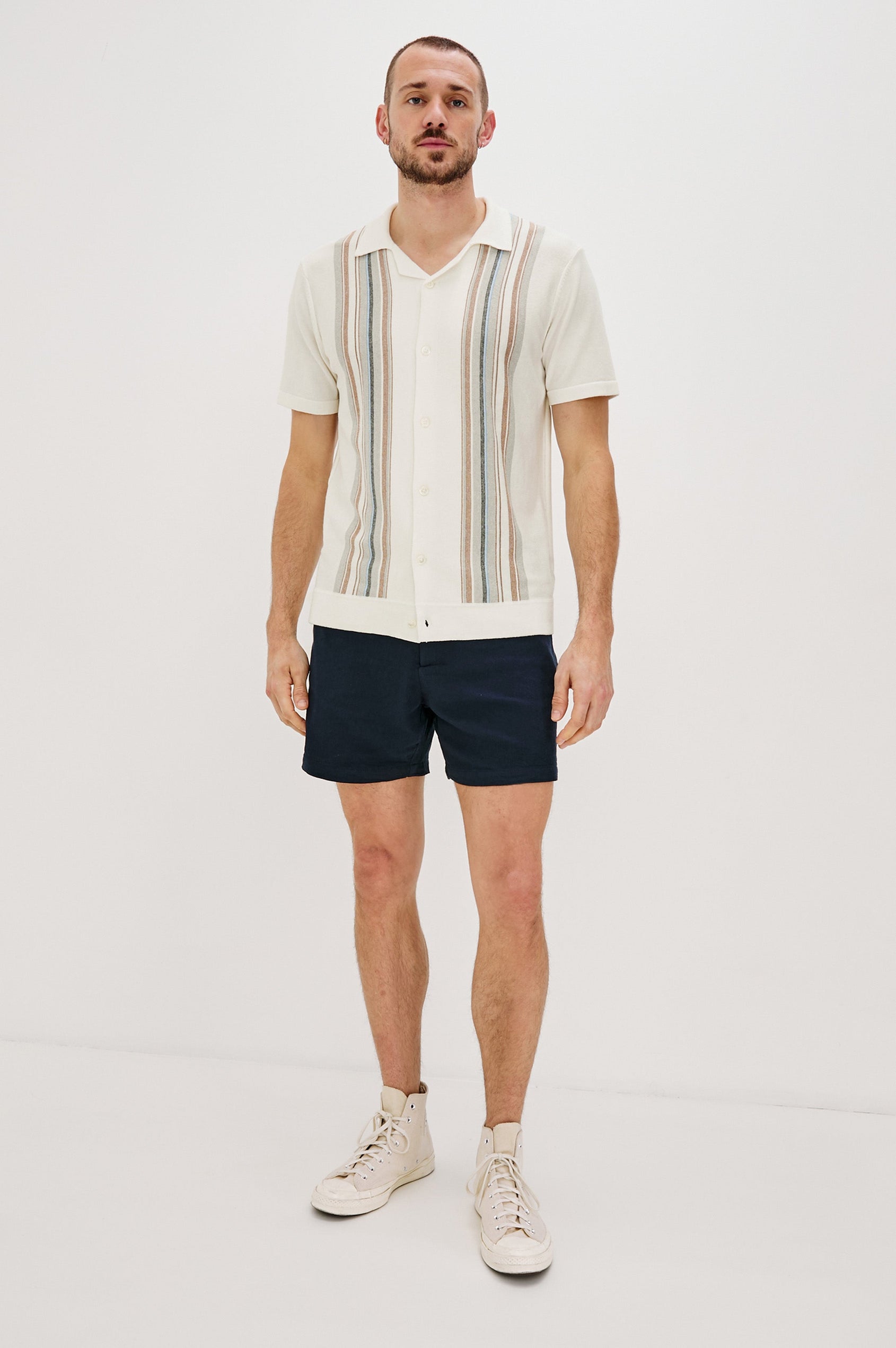 Silas Short-Sleeve Button Up in White Multi Colorway, with two front sections of vertical stripes in Blues, brown and grey - Full Body Front View Featured on Model
