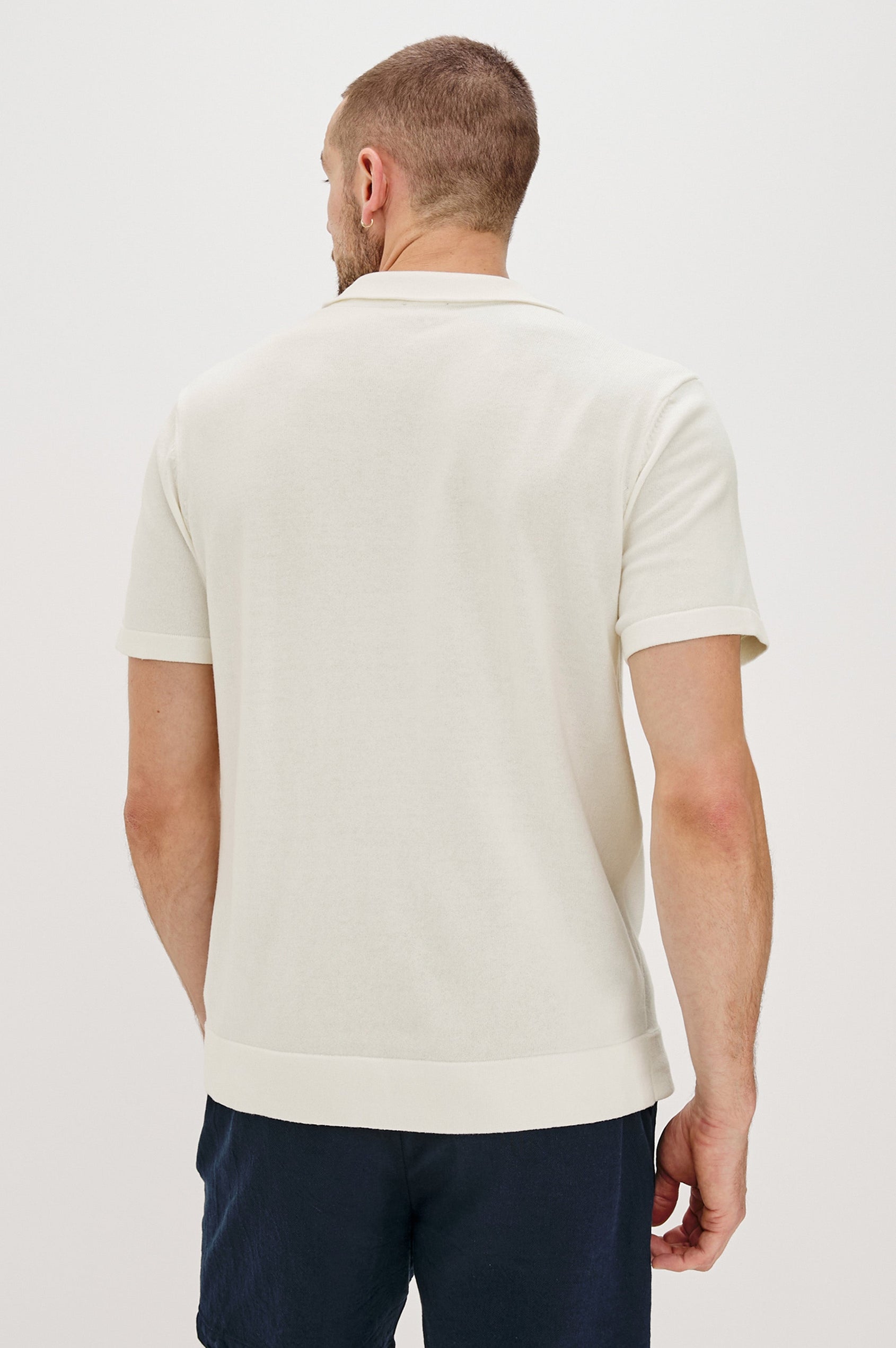 Silas Short-Sleeve Button Up in White Multi Colorway, with two front sections of vertical stripes in Blues, brown and grey - Back View Featured on Model