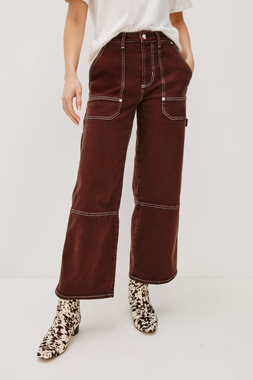 Silverado high rise wide leg crop pant with carpenter style details and contrast stitching in Chocolate Contrast Stitch - front view on model.