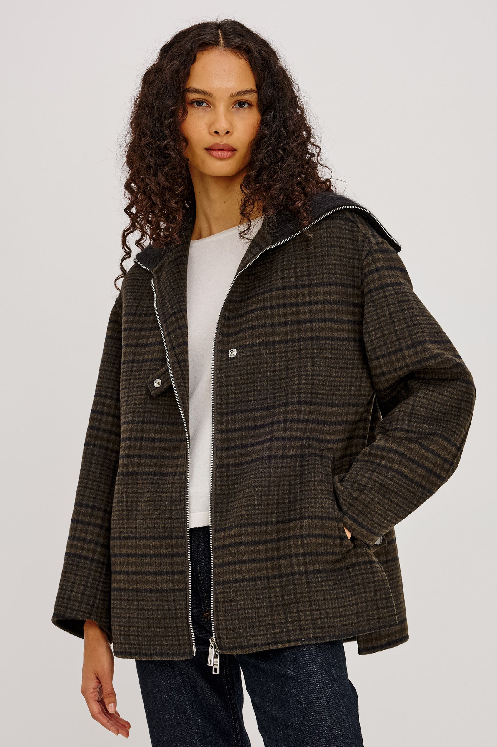 Silves Jacket in Heavy Wool Blend With Contrast Brushed Shawl Collar, Two-Way Front Zip, Single Snap Button, Long Sleeves, and Side Pockets in Highland Plaid Colorway - Upper Body Front View Featured on Model