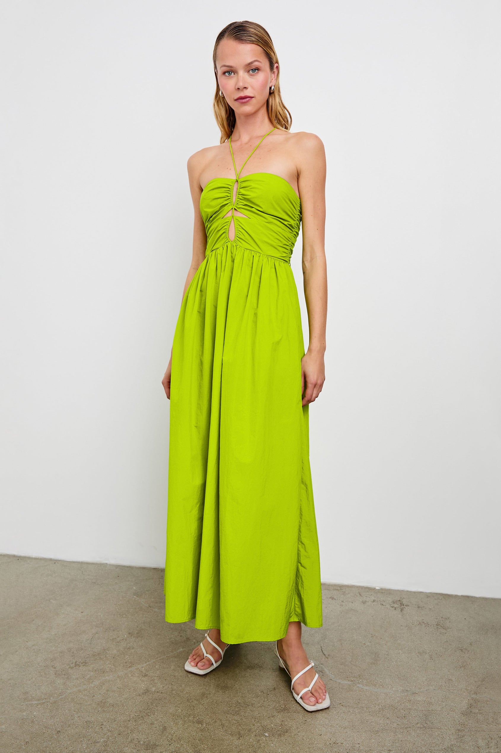 Silvia Sleeveless Maxi Dress with Spaghetti Straps with a Lower Back Tie, an Open Back, and Cutouts Along the Center of the Bodice in Banana Leaf Colorway - Front Full Body View Featured on Model