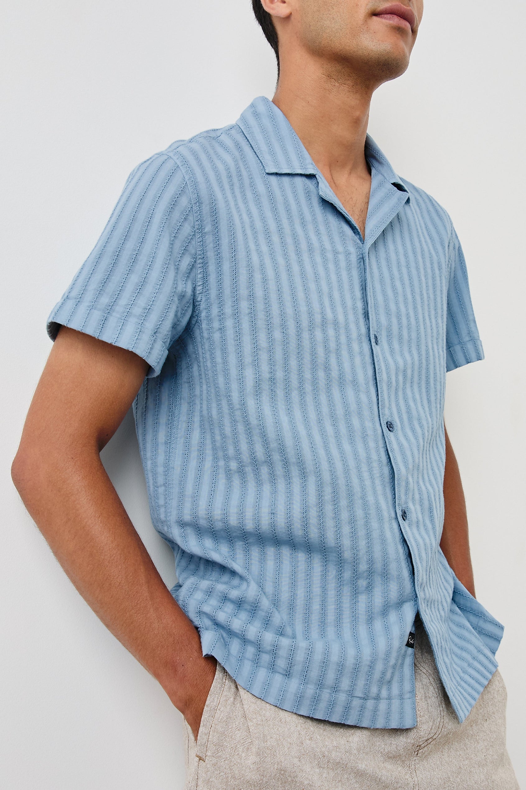 Sinclair short sleeve button up shirt with camp collar in Faded Blue with stripes - front view on model