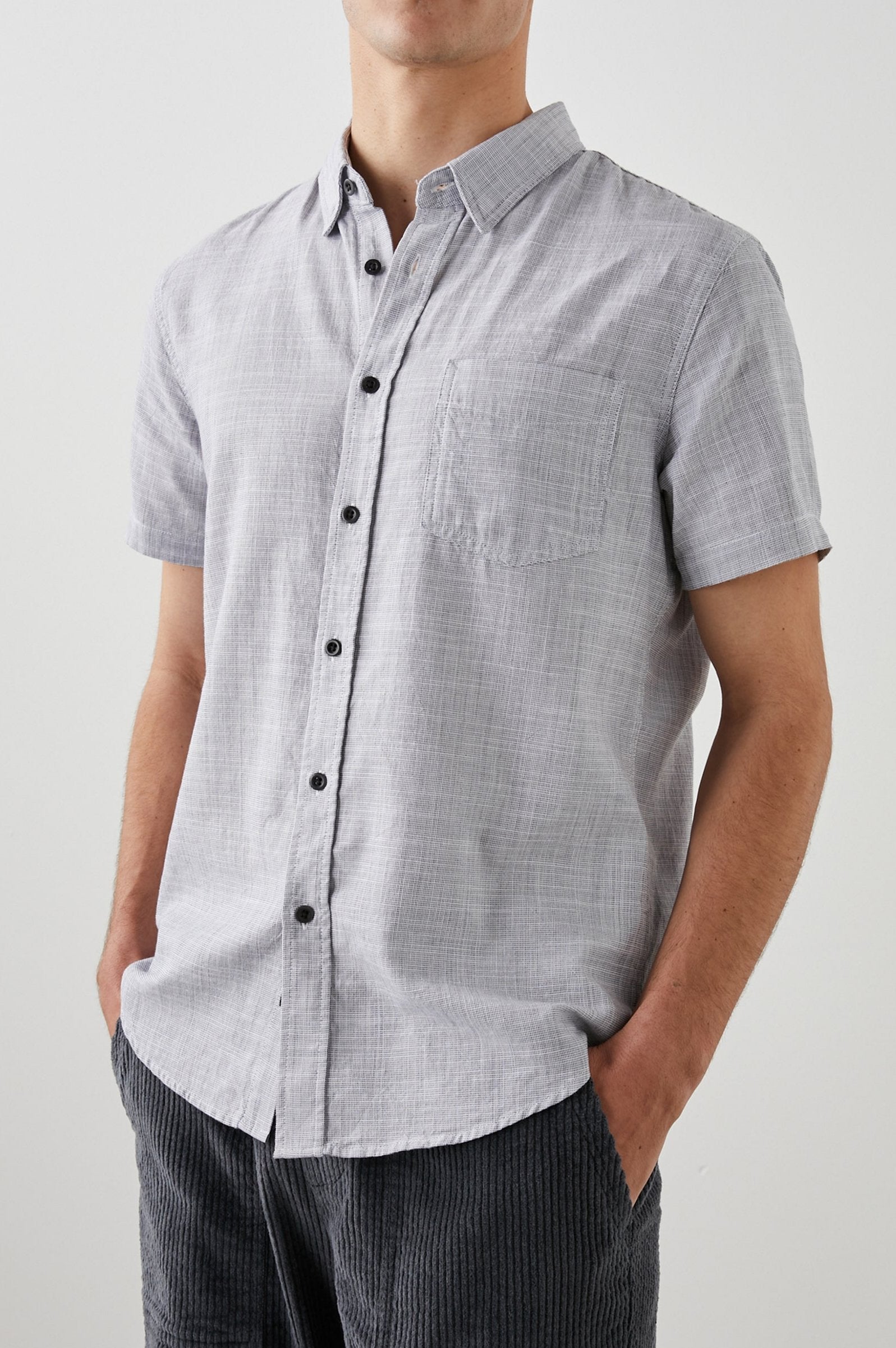 Fairfax Short-Sleeve Button Up with a Chest Patch Pocket in Iron Gate Colorway - Front View Featured on Model