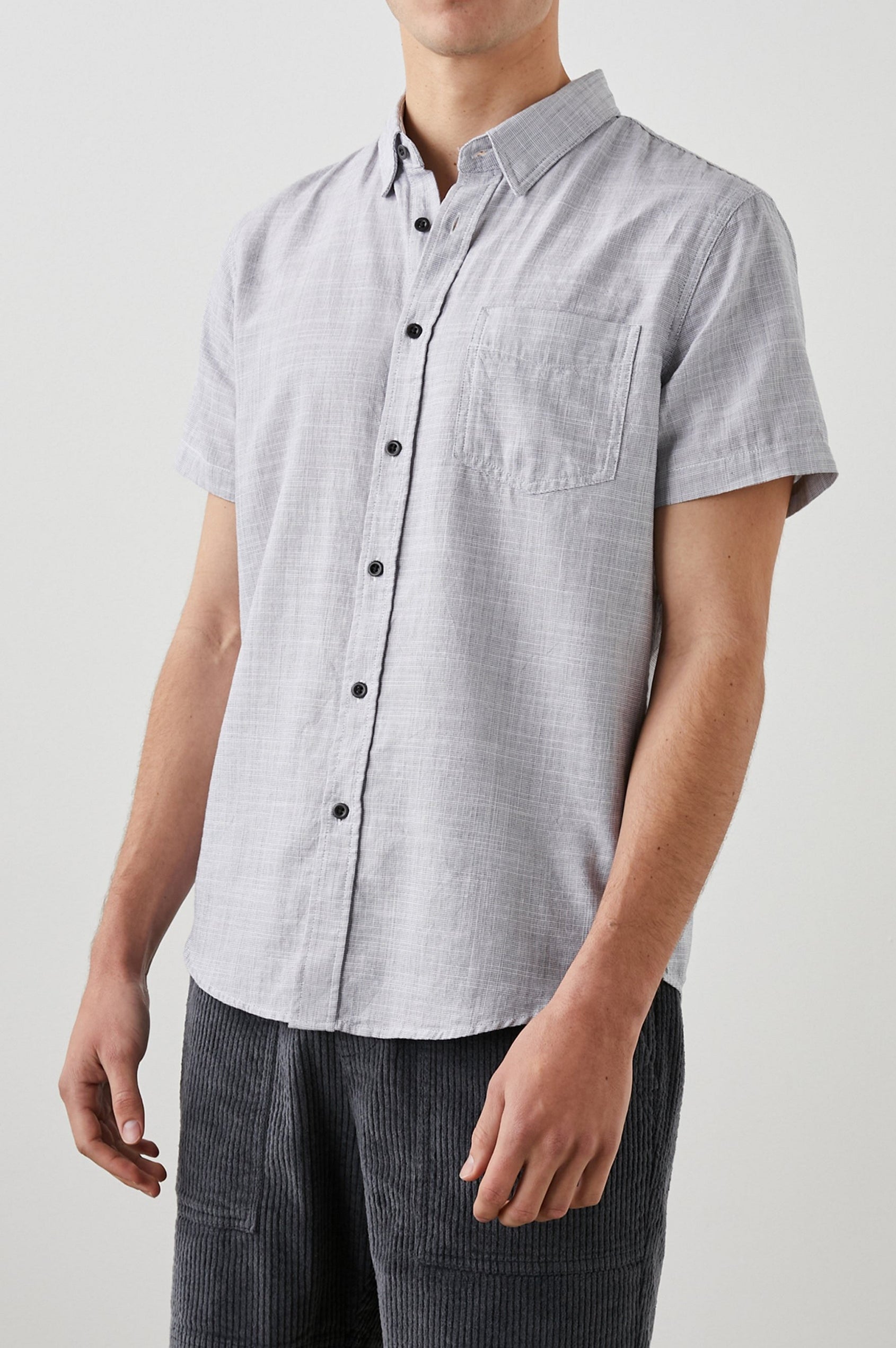 Fairfax Short-Sleeve Button Up with a Chest Patch Pocket in Iron Gate Colorway - Front View Featured on Model
