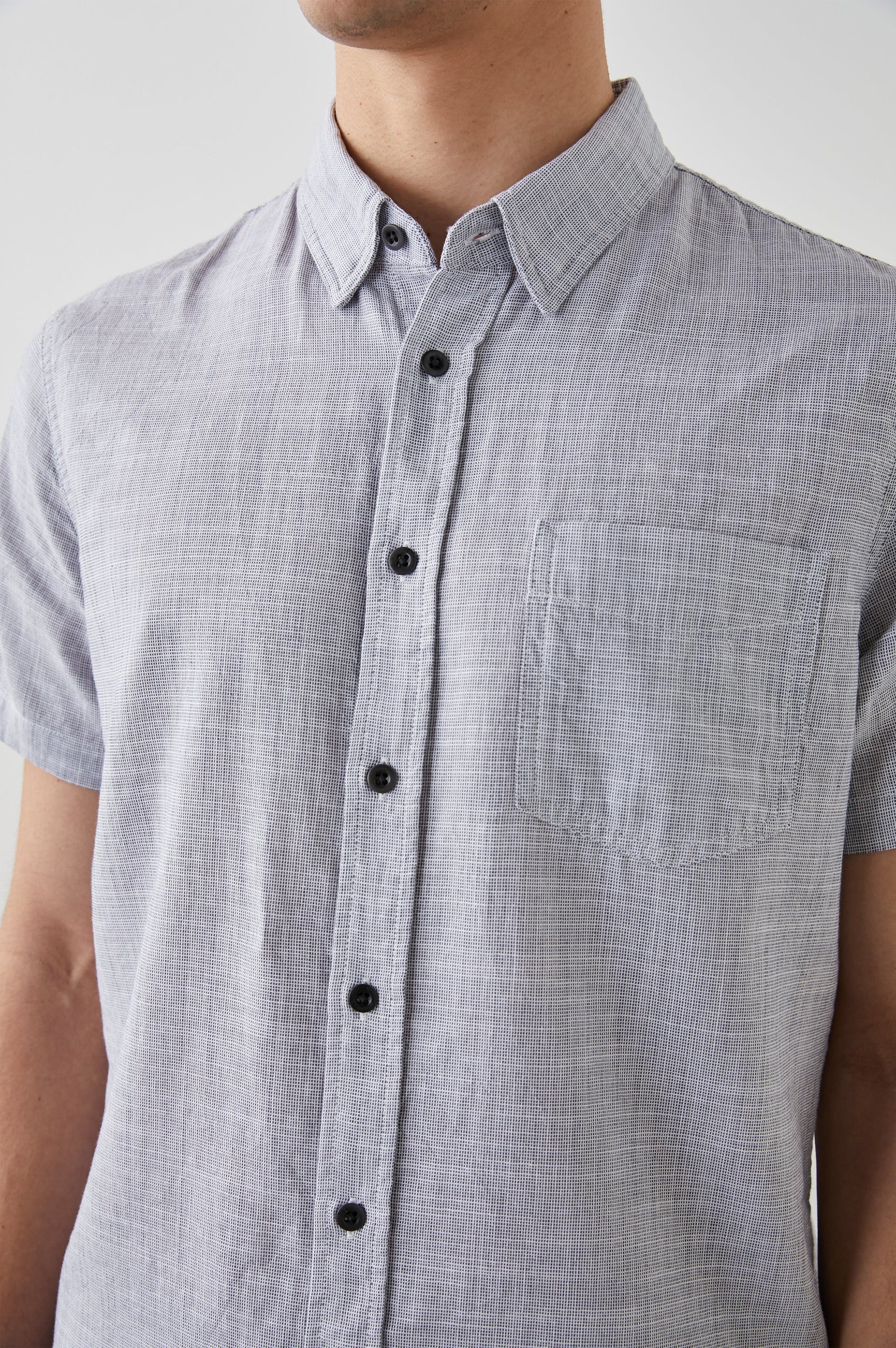 Fairfax Short-Sleeve Button Up with a Chest Patch Pocket in Iron Gate Colorway - Front View Featured on Model