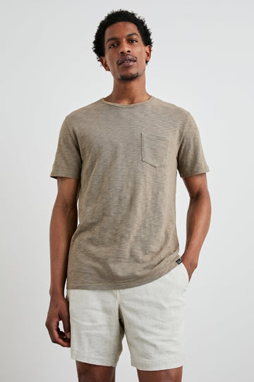 Skipper Short-Sleeve T-shirt with a Crew Neck and a Chest Patch Pocket in Barley Colorway - Front View Featured on Model
