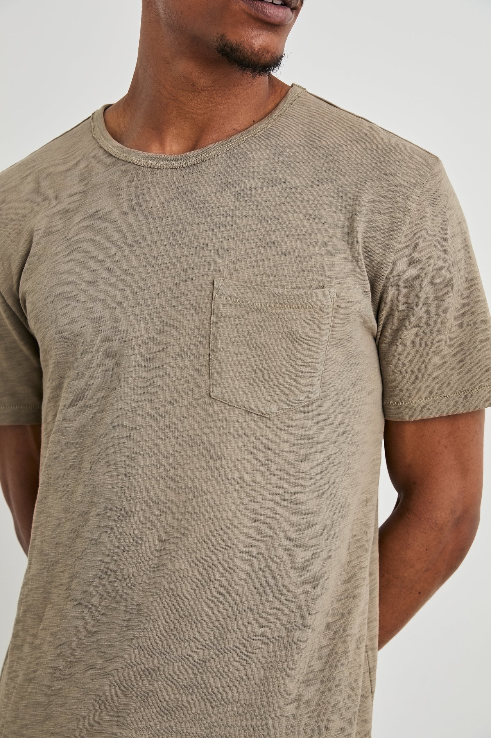 Skipper Short-Sleeve T-shirt with a Crew Neck and a Chest Patch Pocket in Barley Colorway - Front View Featured on Model