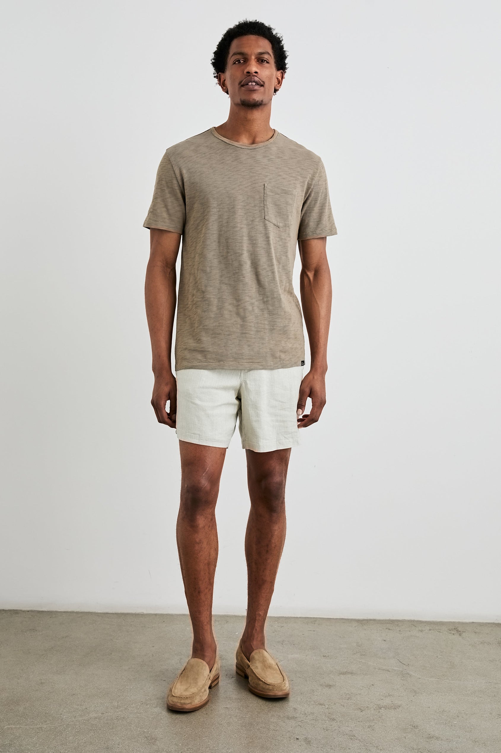 Skipper Short-Sleeve T-shirt with a Crew Neck and a Chest Patch Pocket in Barley Colorway - Front Full Body View Featured on Model