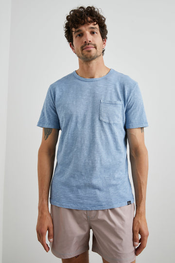 Skipper Short-Sleeve T-shirt with a Crew Neck and a Chest Patch Pocket in Celsius Colorway, a Blue - Front View Featured on Model