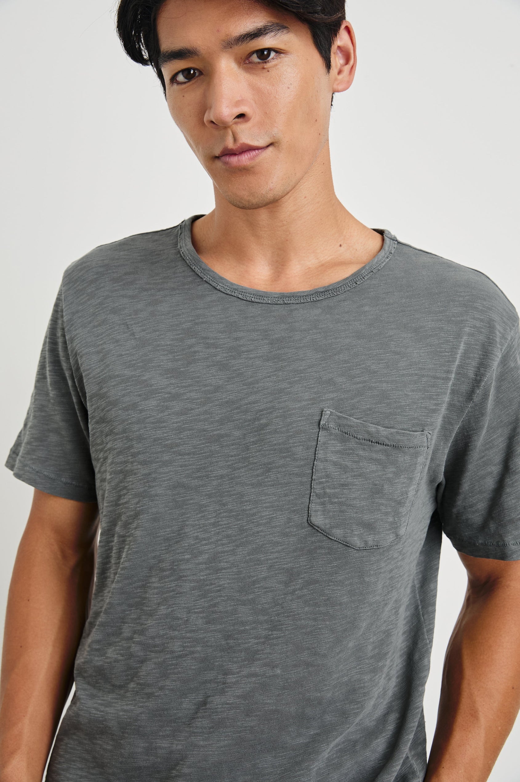 Skipper Short-Sleeve T-shirt with a Crew Neck and a Chest Patch Pocket in Washed Black Colorway - Front View Featured on Model