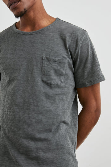 Skipper Short-Sleeve T-shirt with a Crew Neck and a Chest Patch Pocket in Washed Black Colorway - Front View Featured on Model