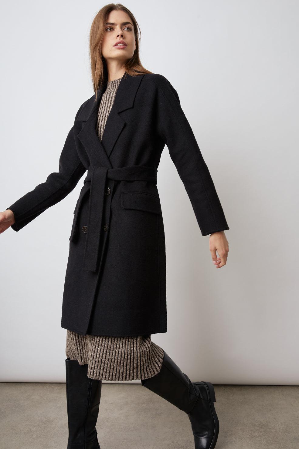 SLOAN BLACK COAT-FULL FRONT BODY IN MOTION