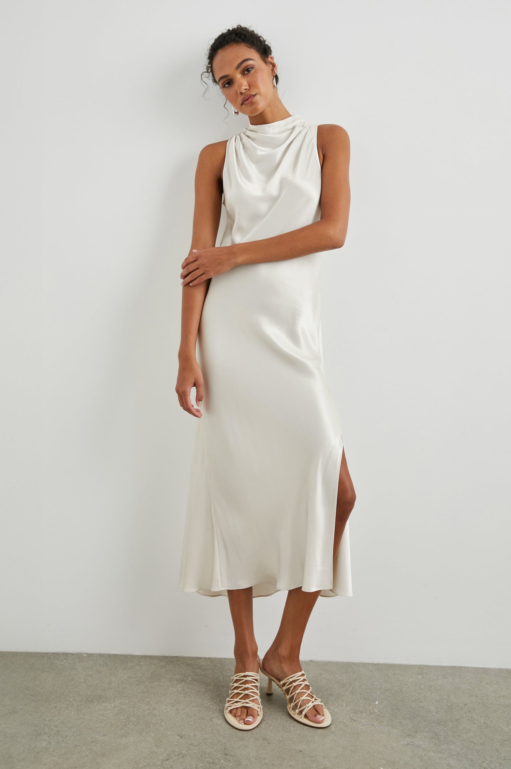 SOLANA DRESS IVORY - FRONT ARM CROSSED
