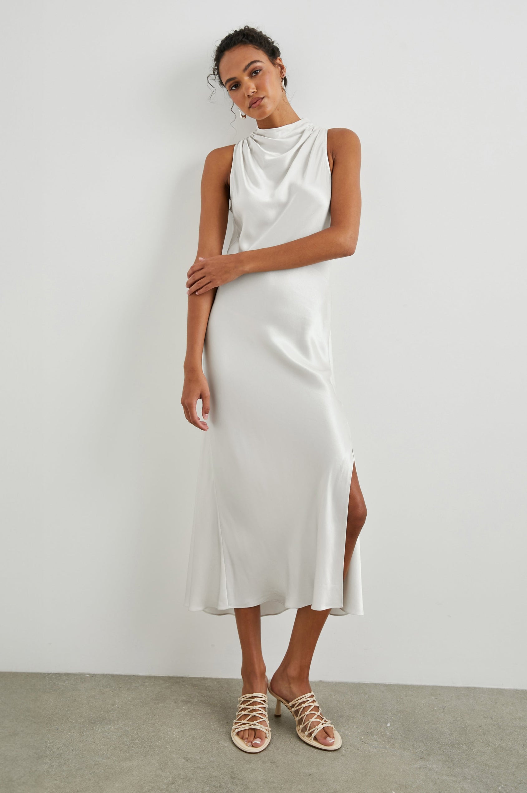 SOLANA DRESS IVORY - FRONT ARM CROSSED