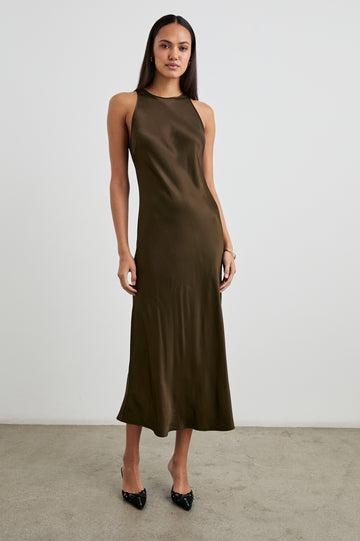 Solene Sleeveless Midi Dress with a Crew Neck and a Tie Keyhole at the Back in Dark Moss Colorway - Front Full Body View Featured on Model