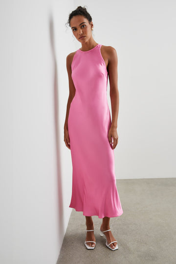 Solene Sleeveless Midi Dress with a Crew Neck and a Tie Keyhole at the Back in Malibu Pink Colorway - Front Full Body View Featured on Model
