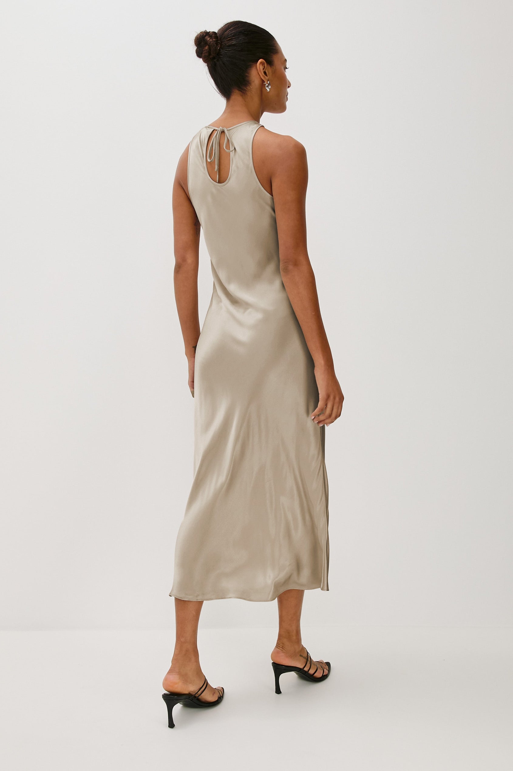 Solene Sleeveless Midi Dress with a Crew Neck and a Tie Keyhole at the Back in Mink Colorway - Back Full Body View Featured on Model