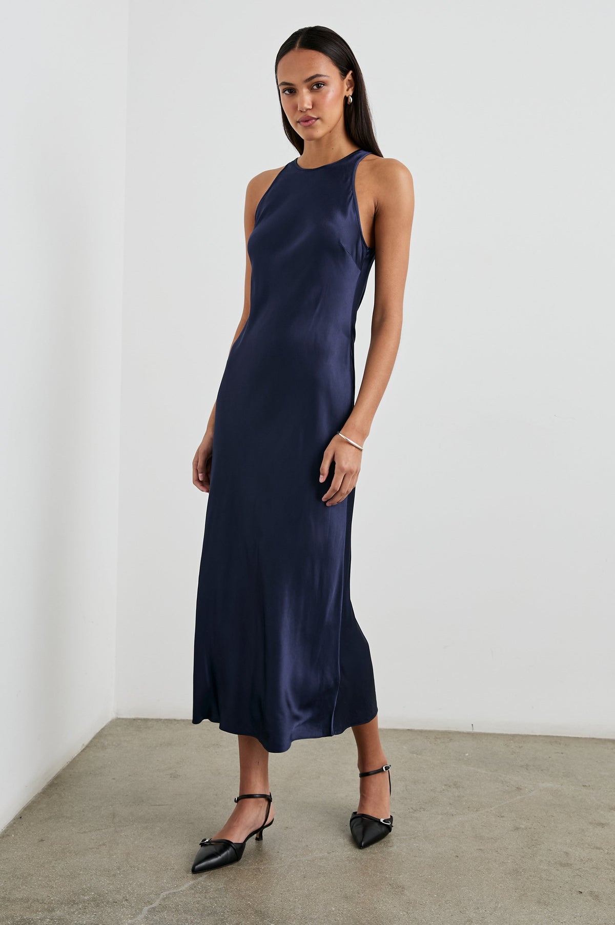 Solene Satin Racerback Midi Dress in Navy Colorway. Full Body Front View Shown on Model.