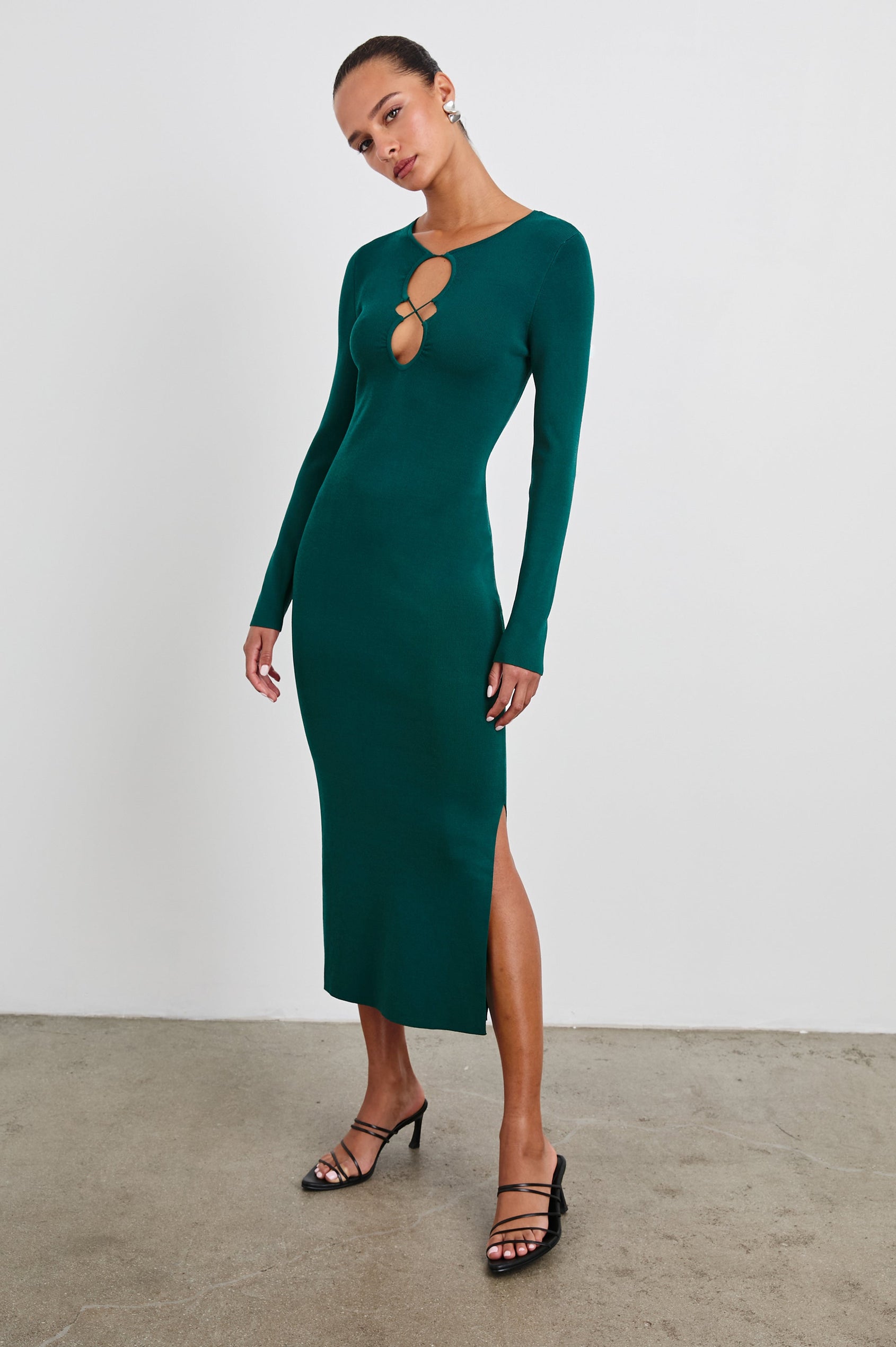 Solma Long-Sleeve Midi Dress with a Deep Geometric Cutout and a Thigh-High Side Slit in Evergreen Colorway - Front Full Body View Featured on Model