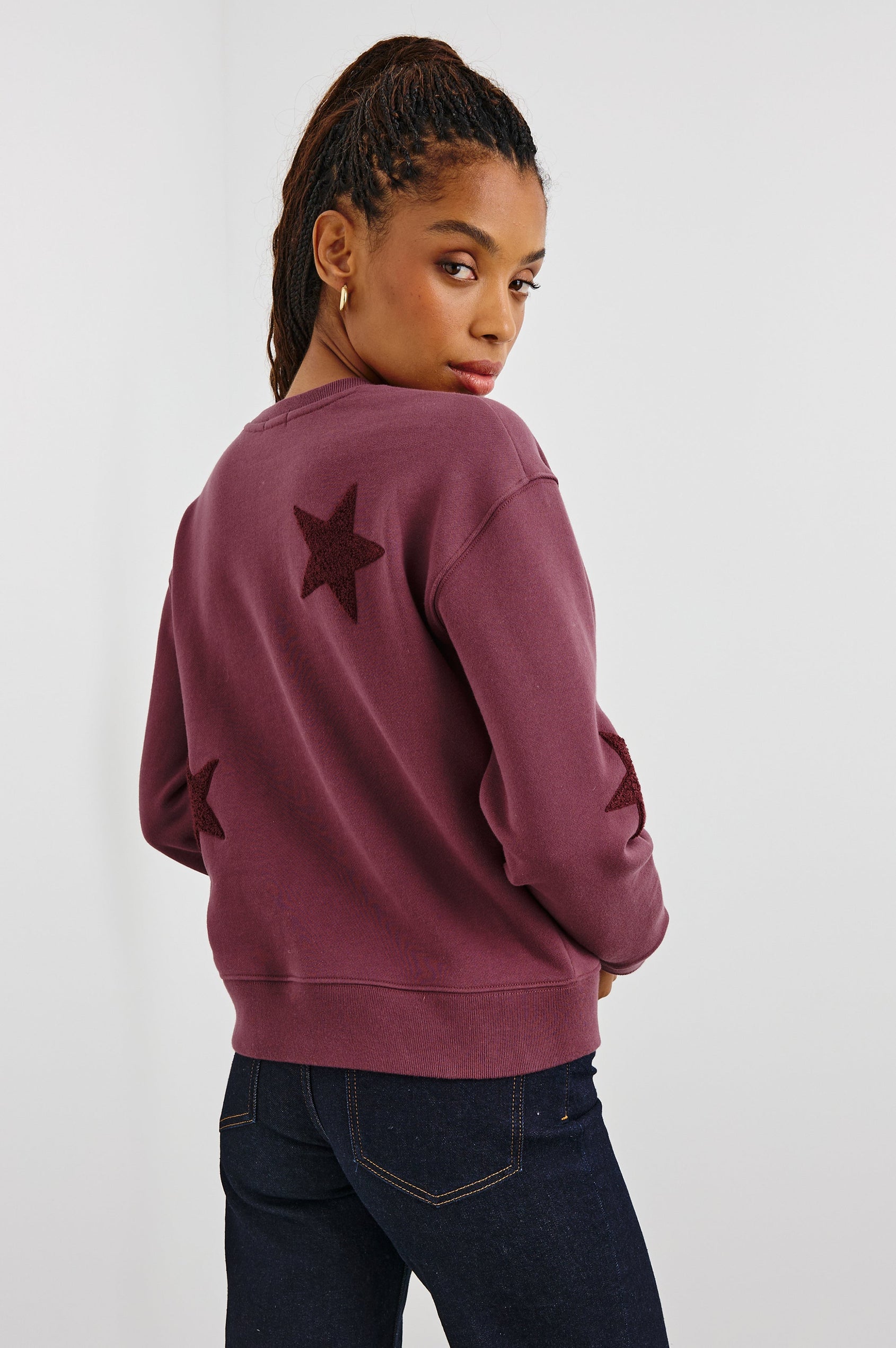 Sonia Long-Sleeve Sweatshirt with a Crew Neck and Patch Stars in Burgundy Colorway, with stars in a darker shade - Back View Featured on Model