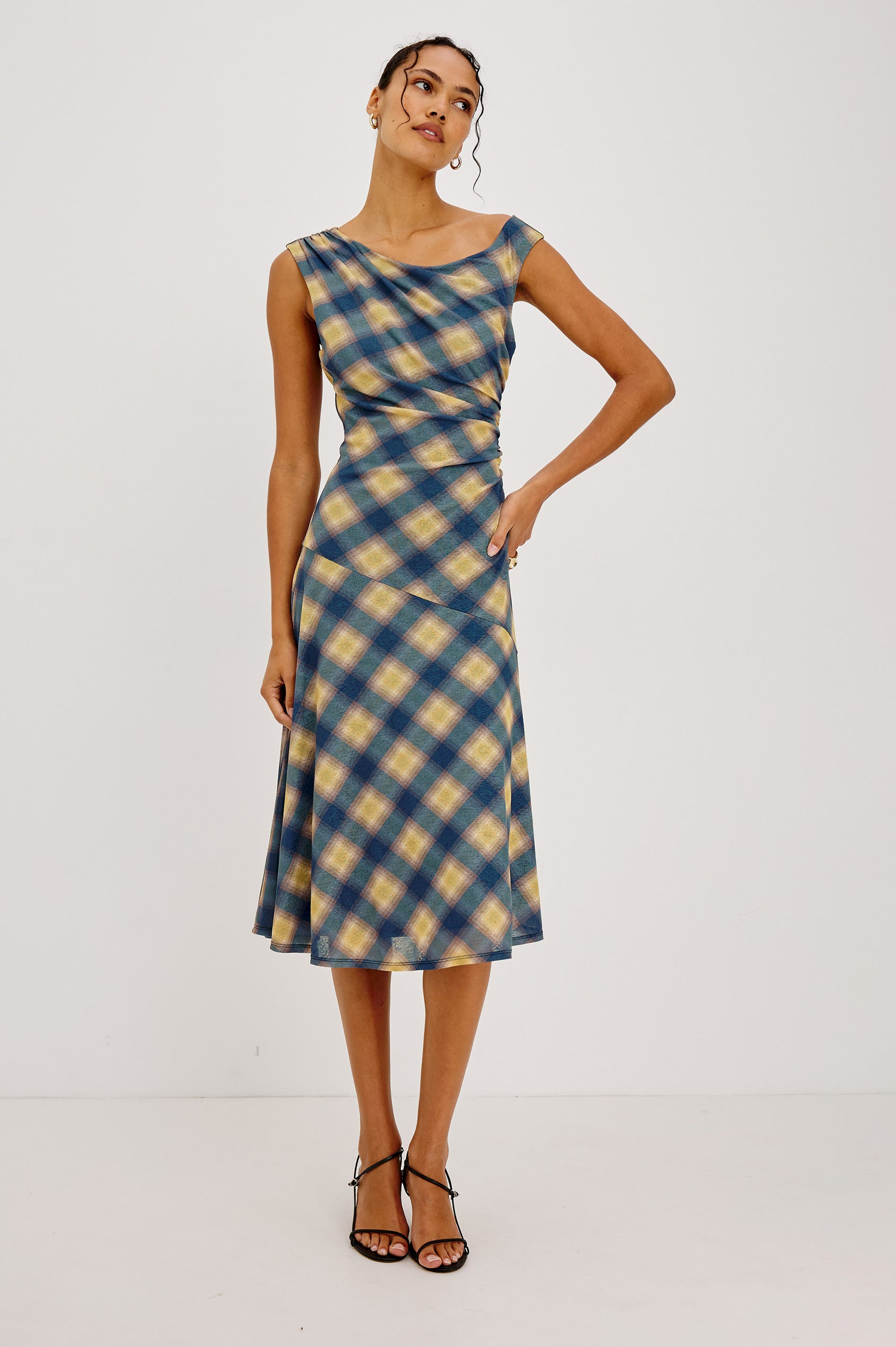 Sorra Midi Dress in Self-Lined Mesh With Asymmetrrical Neckline, Shirred Shoulder Strap, Side Waist Ruching, Bias-Cut Skirt in Navy Sage Plaid Colorway - Full Body Front View Featured on Model