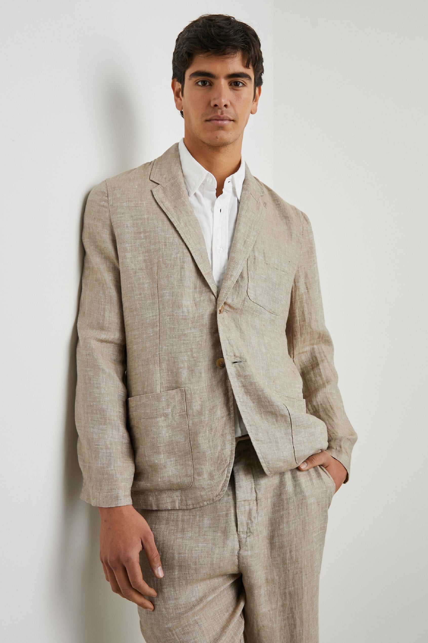 Sorrento Blazer with Two Button Closure, Two Front Flap Pockets, a Chest Patch Pocket and Three-Button Cuffs in Bulgur Colorway - Front View Featured on Model