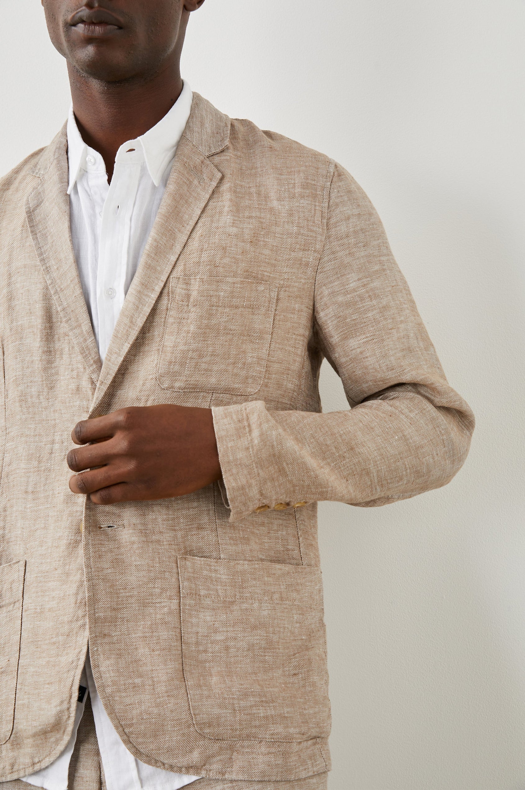 Sorrento Blazer with Two Button Closure, Two Front Flap Pockets, a Chest Patch Pocket and Three-Button Cuffs in Bulgur Colorway - Front View Featured on Model