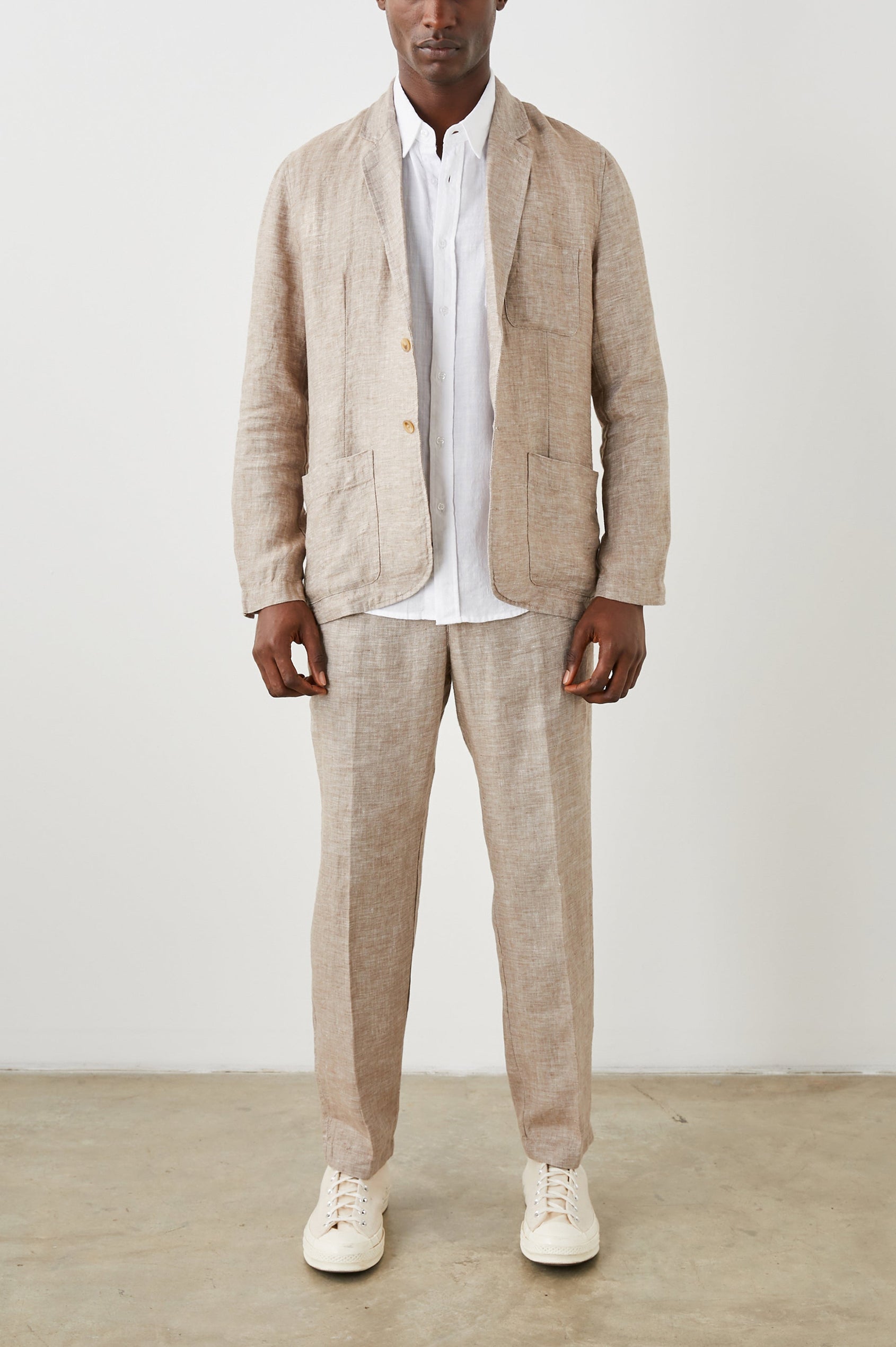 Sorrento Blazer with Two Button Closure, Two Front Flap Pockets, a Chest Patch Pocket and Three-Button Cuffs in Bulgur Colorway - Front Full Body View Featured on Model