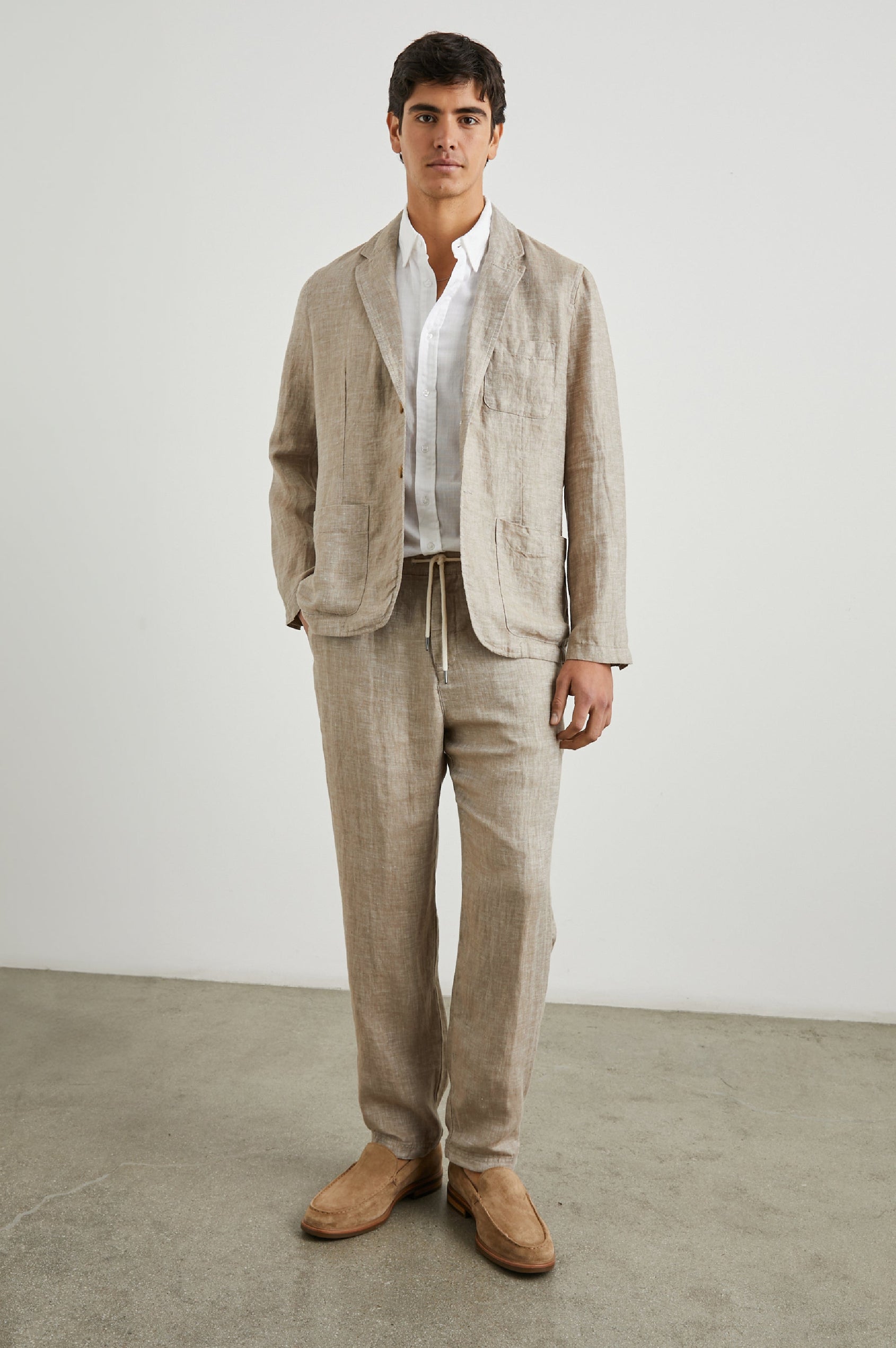 Sorrento Blazer with Two Button Closure, Two Front Flap Pockets, a Chest Patch Pocket and Three-Button Cuffs in Bulgur Colorway - Front Full Body View Featured on Model