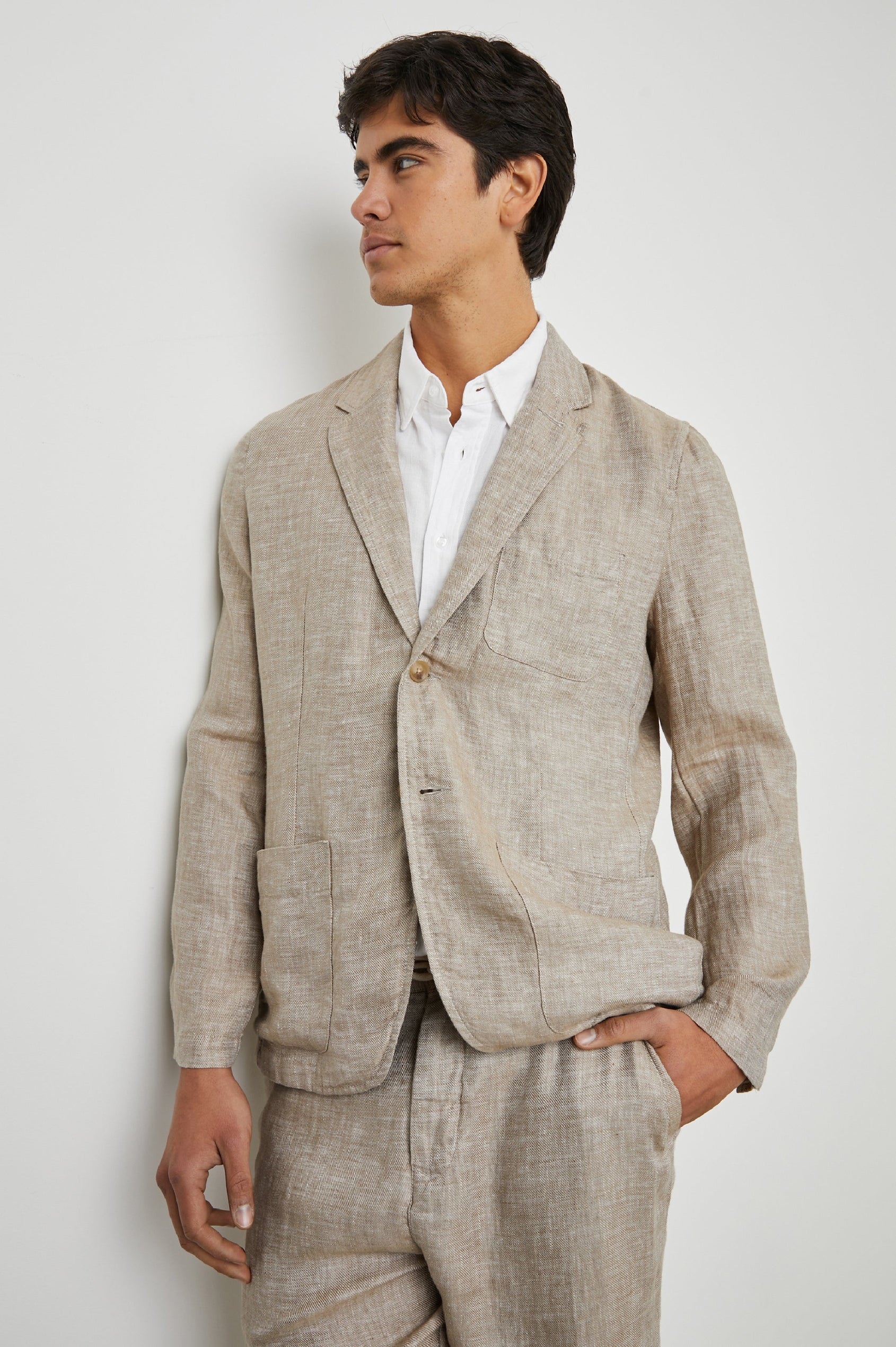 Sorrento Blazer with Two Button Closure, Two Front Flap Pockets, a Chest Patch Pocket and Three-Button Cuffs in Bulgur Colorway - Front View Featured on Model