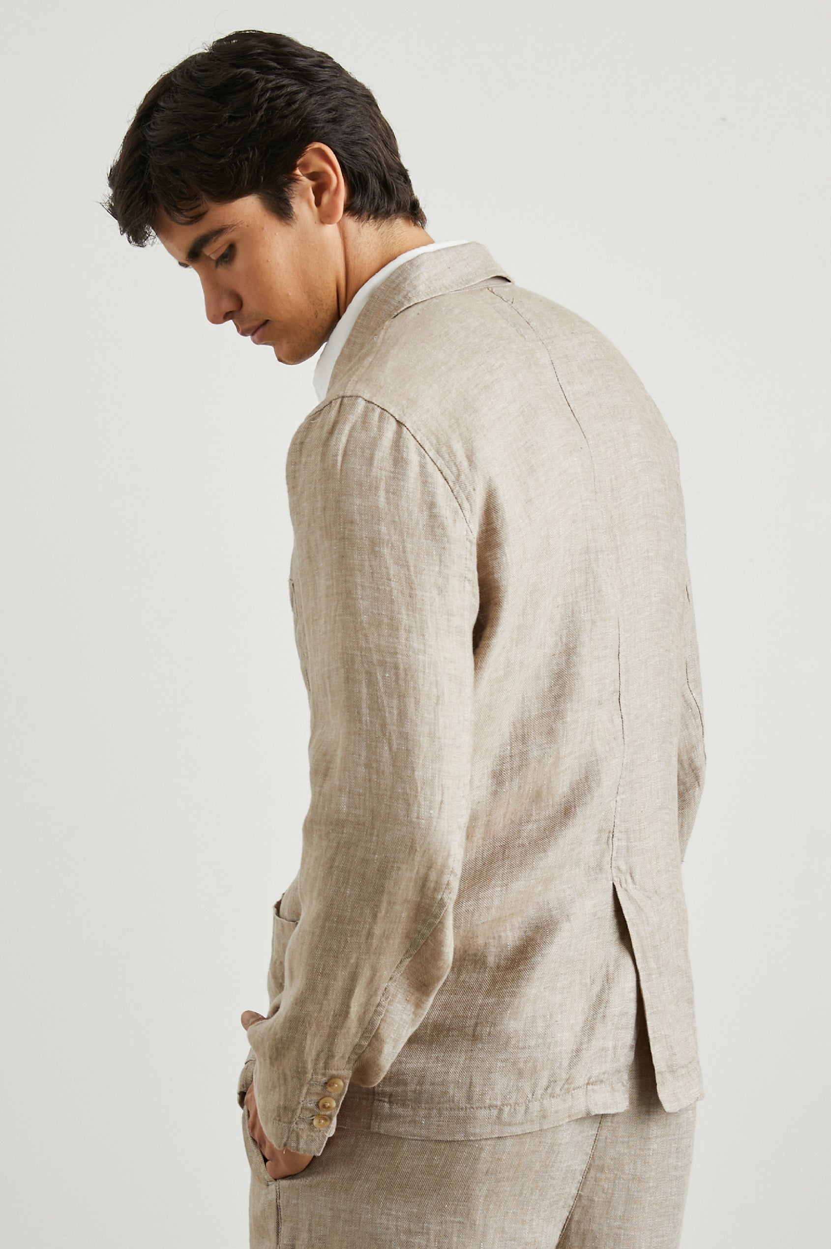 Sorrento Blazer with Two Button Closure, Two Front Flap Pockets, a Chest Patch Pocket and Three-Button Cuffs in Bulgur Colorway - Back View Featured on Model