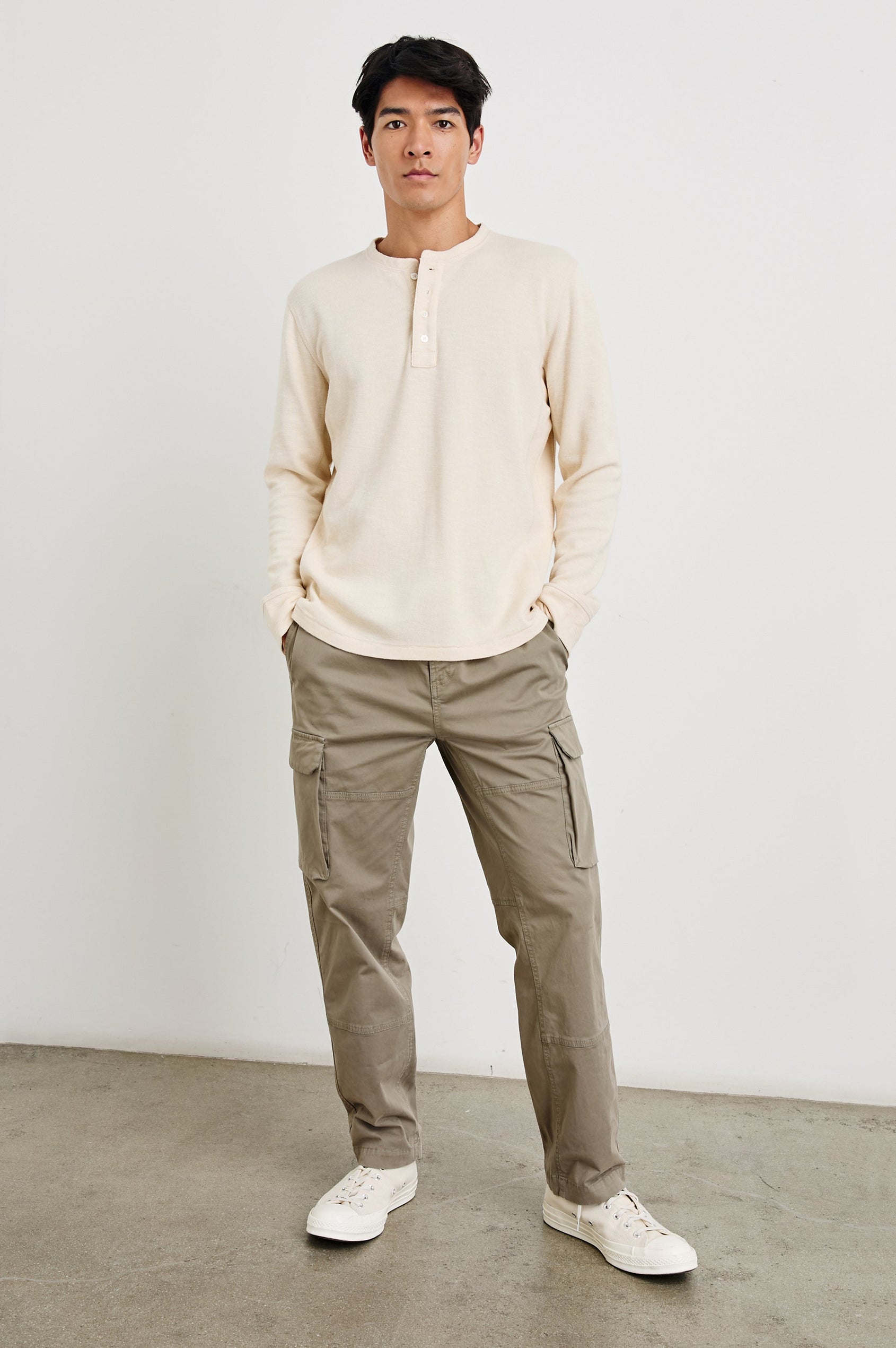 Soto Long-Sleeve Henley with a Four Button Placket and a Crew Neck in Bone Colorway - Front Full Body View Featured on Model