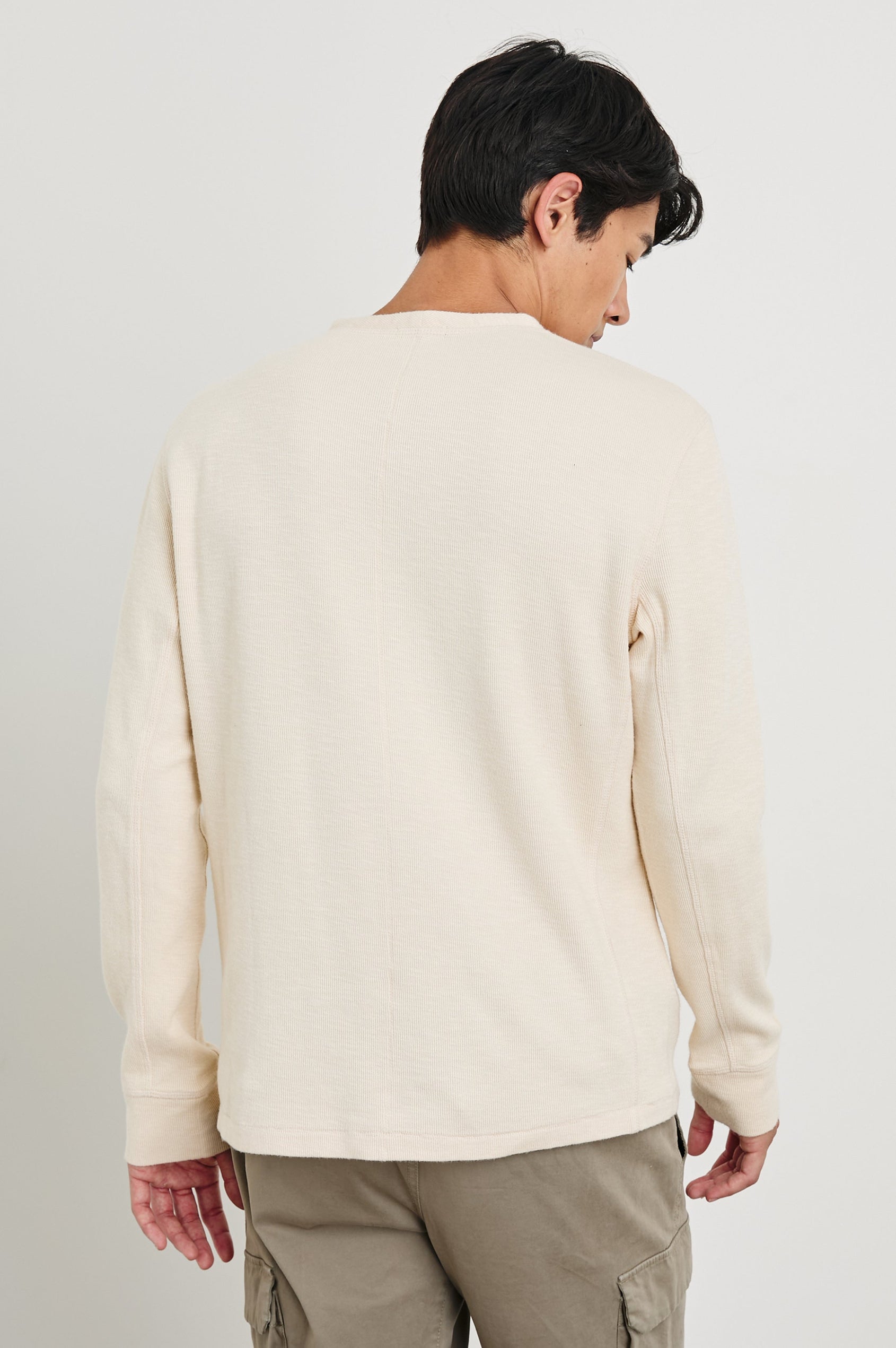 Soto Long-Sleeve Henley with a Four Button Placket and a Crew Neck in Bone Colorway - Back View Featured on Model