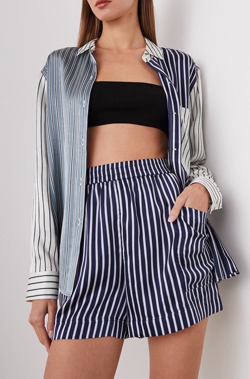 Spencer Long-Sleeve Button Up with Chest Patch Pocket in Kent Multi Stripe Colorway, Patches of different colored vertical and horizontal stripes in blue and whites - Front Unbuttoned View Featured on Model