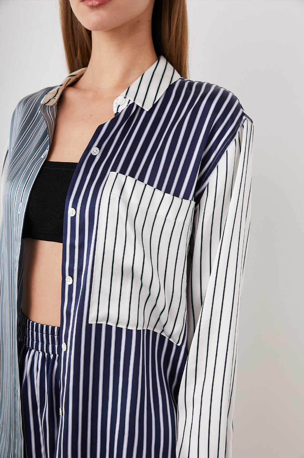 Spencer Long-Sleeve Button Up with Chest Patch Pocket in Kent Multi Stripe Colorway, Patches of different colored vertical and horizontal stripes in blue and whites - Front Unbuttoned View Featured on Model