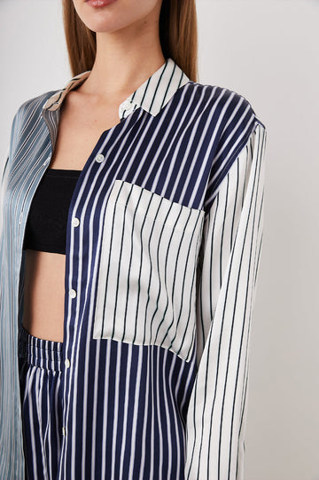 Spencer Long-Sleeve Button Up with Chest Patch Pocket in Kent Multi Stripe Colorway, Patches of different colored vertical and horizontal stripes in blue and whites - Front Unbuttoned View Featured on Model