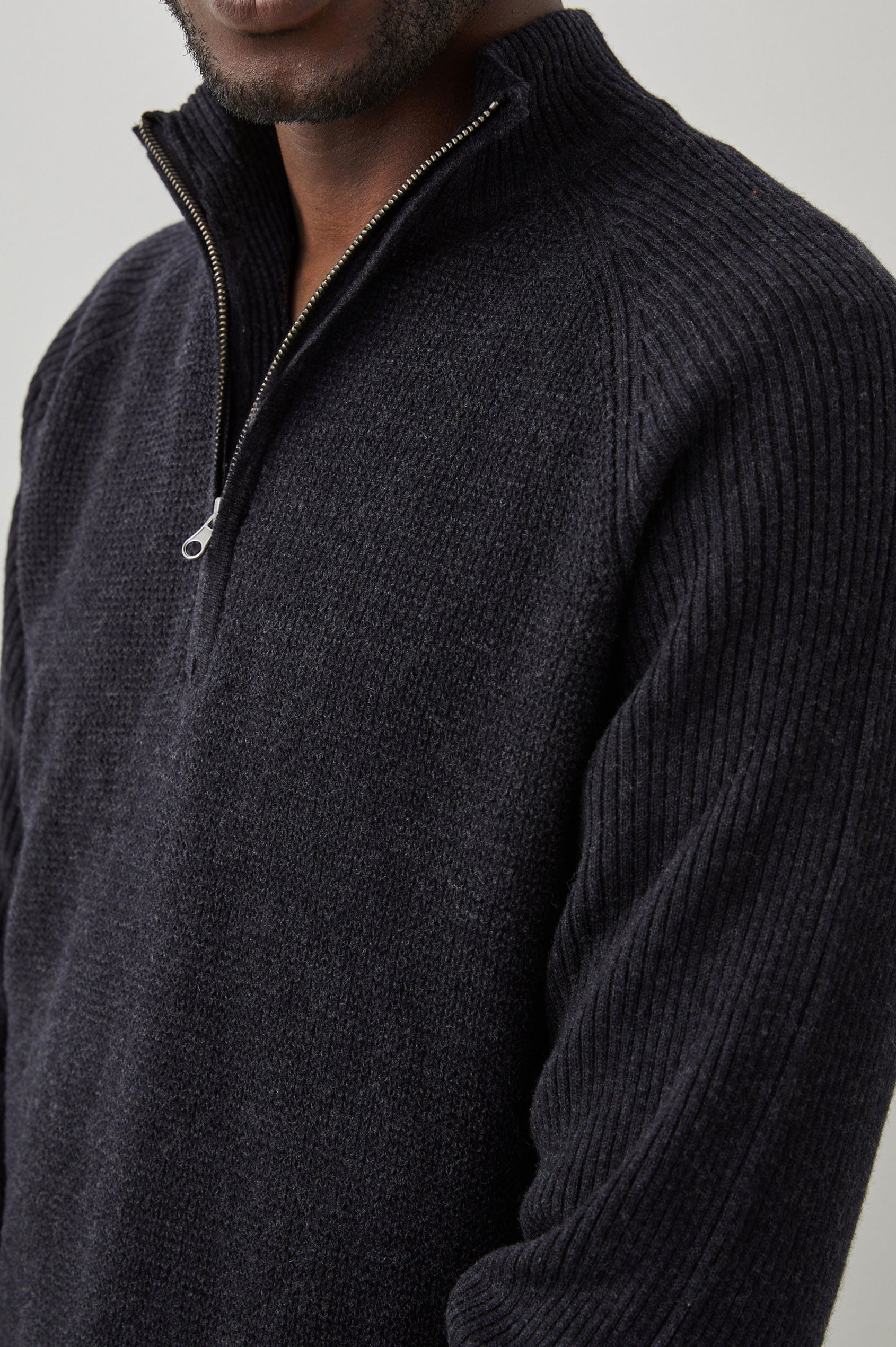 Stark Long-Sleeve Quarter Zip with a Mock Neck, Waffle Torso, and Ribbed Sleeves in Cast Iron Colorway - Front View Featured on Model