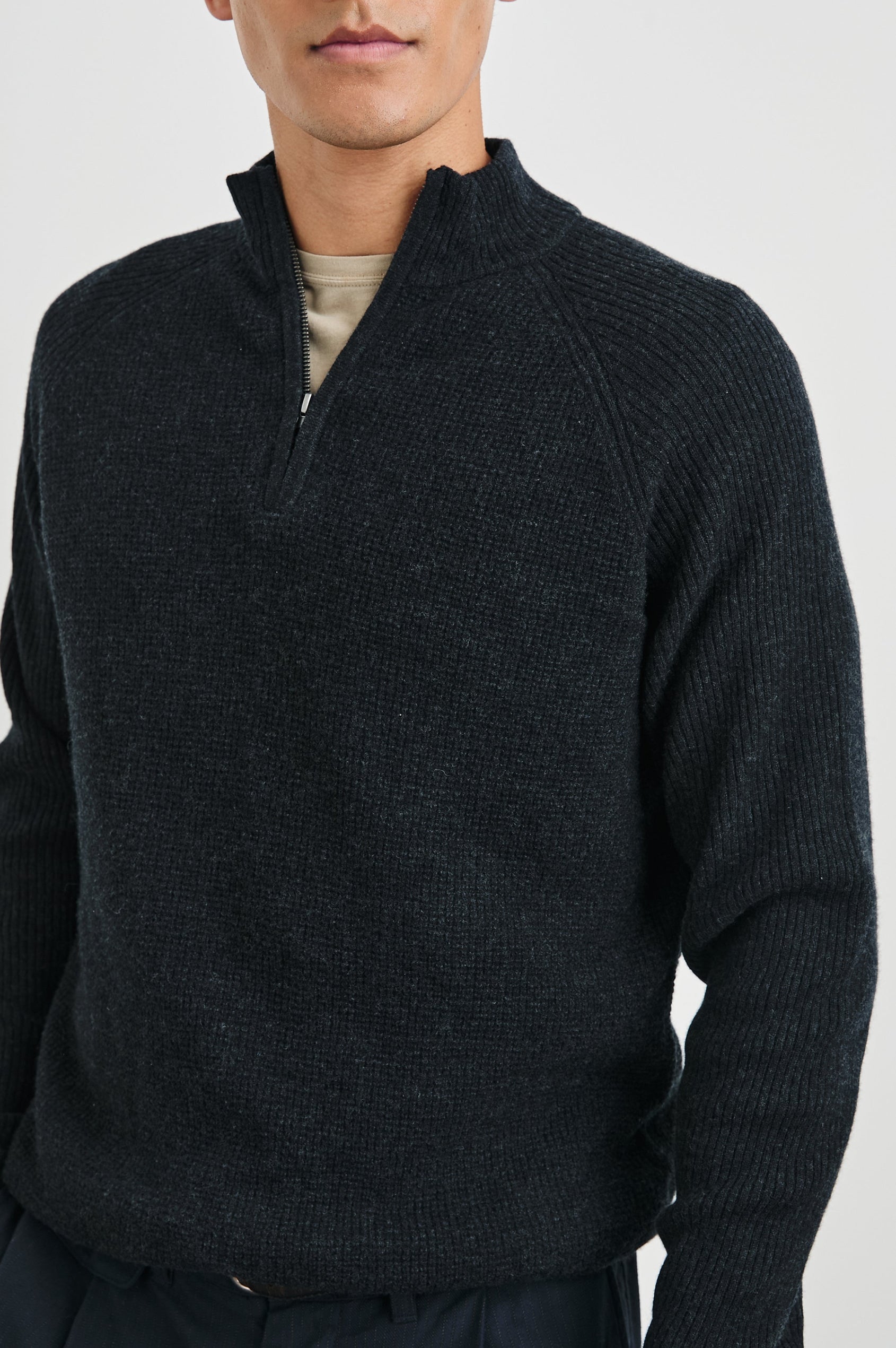 Stark Long-Sleeve Quarter Zip with a Mock Neck, Waffle Torso, and Ribbed Sleeves in Cast Iron Colorway - Front View Featured on Model