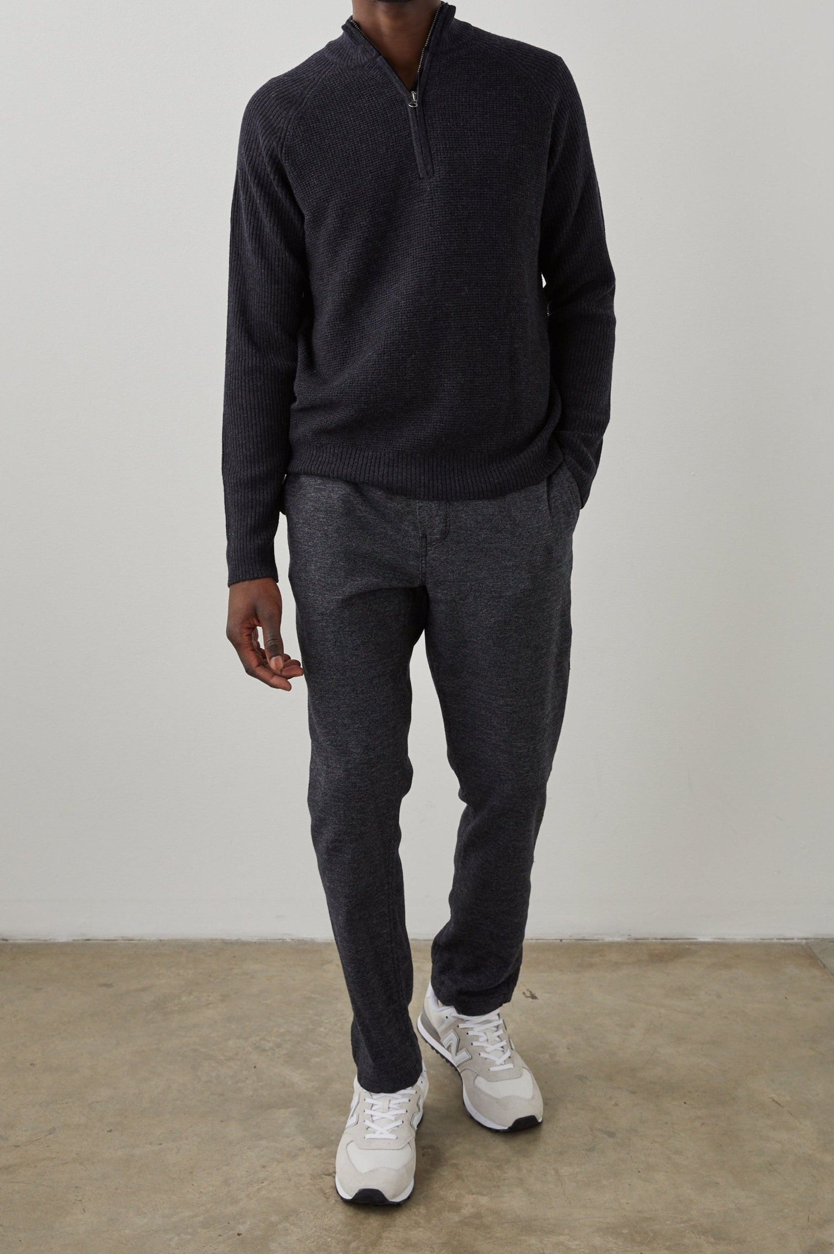 Stark Long-Sleeve Quarter Zip with a Mock Neck, Waffle Torso, and Ribbed Sleeves in Cast Iron Colorway - Front Full Body View Featured on Model