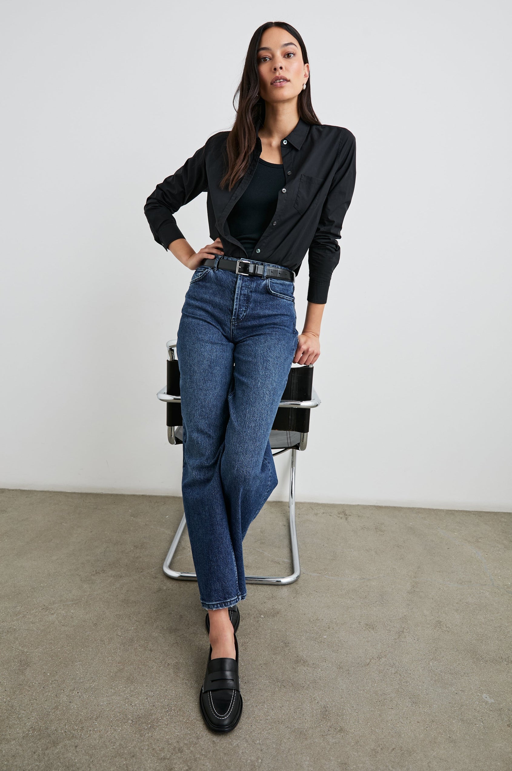 Stina Long-Sleeve Button Up with a Chest Patch Pocket in Black Colorway - Front Tucked Full Body View Featured on Model