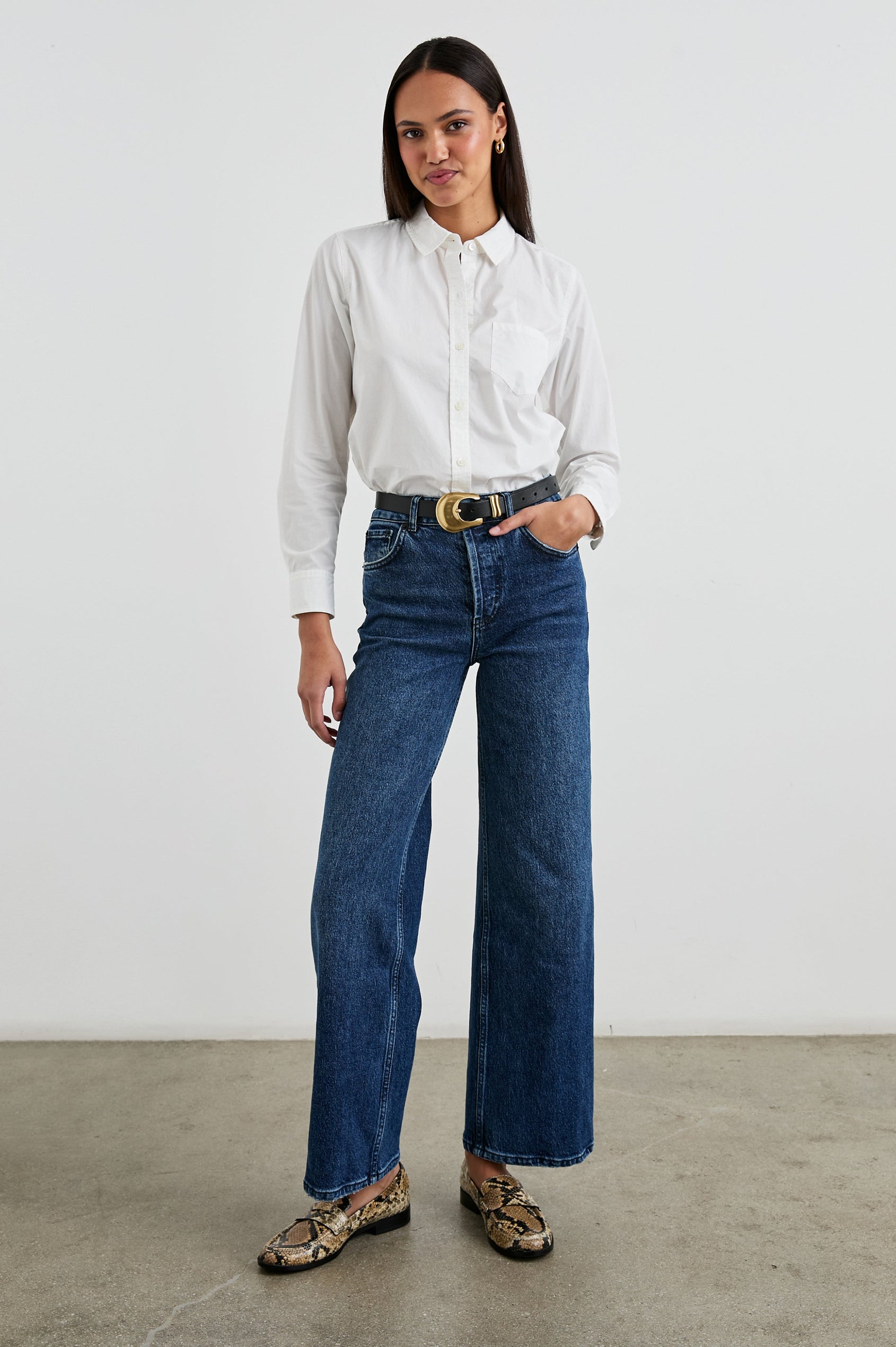 Stina Long-Sleeve Button Up with a Chest Patch Pocket in White Colorway - Front Tucked Full Body View Featured on Model