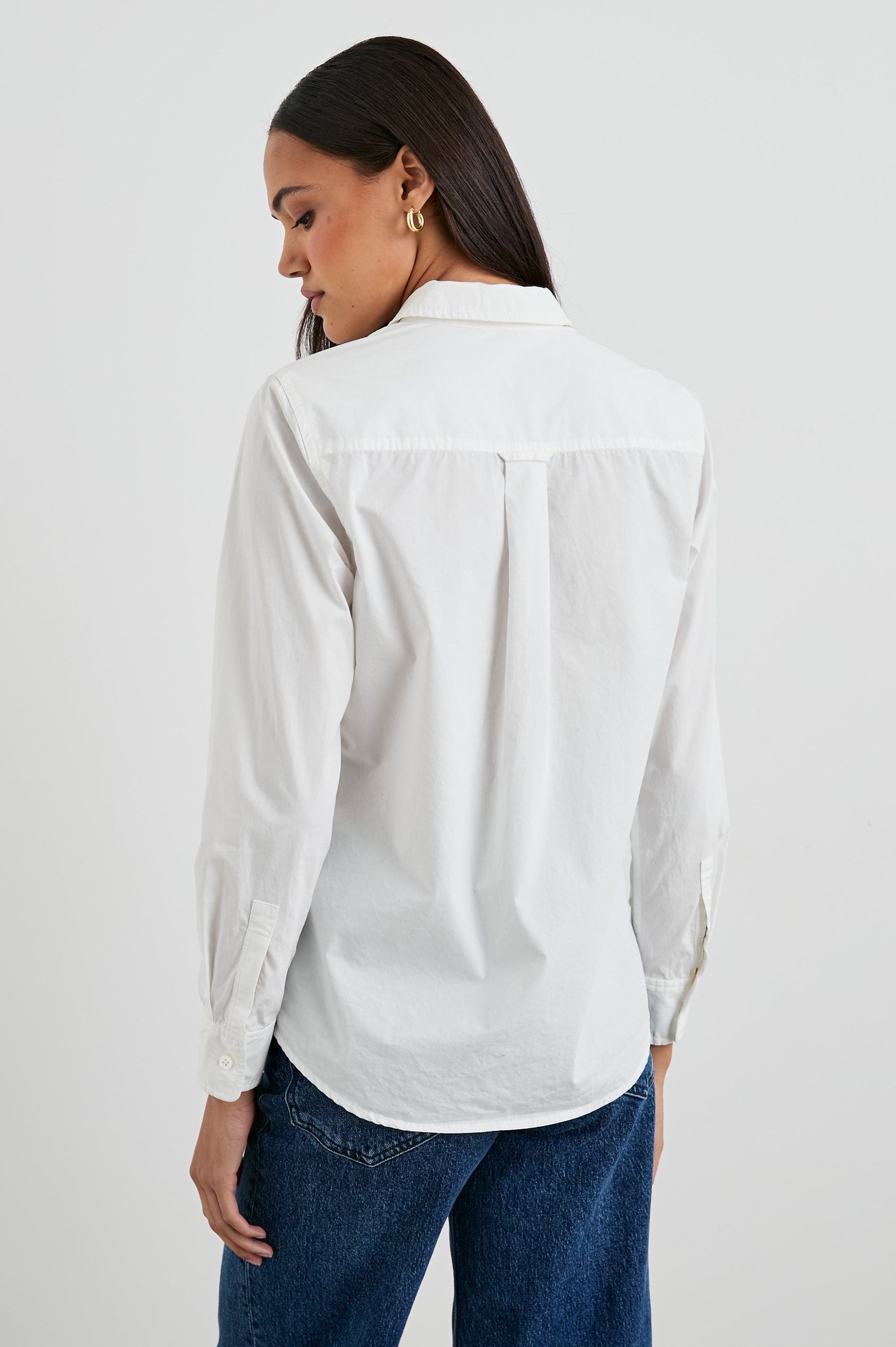 Stina Long-Sleeve Button Up with a Chest Patch Pocket in White Colorway - Back View Featured on Model