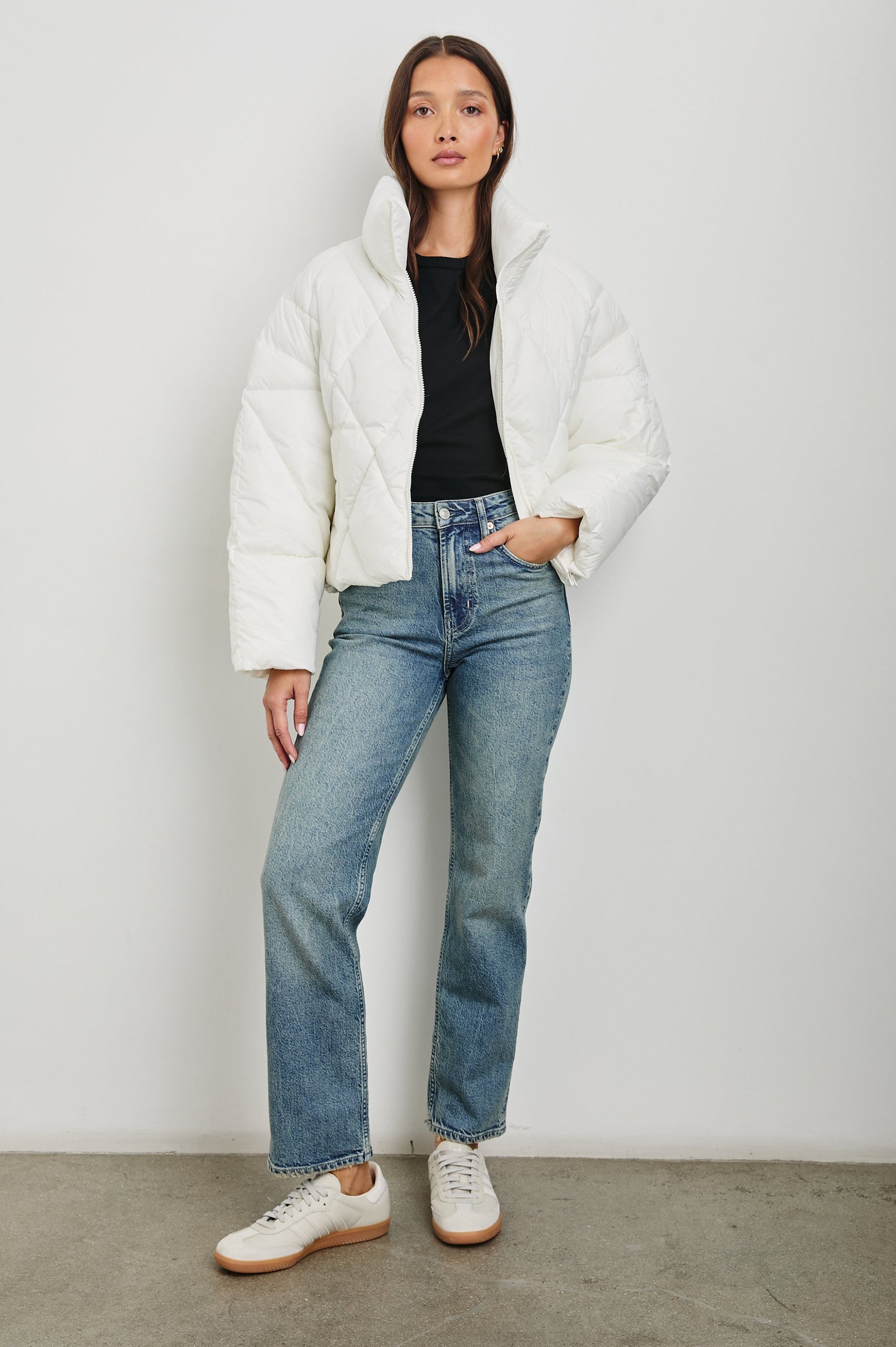 Summit Cropped Puffer Jacket with a Mid-Neck Collar, Two Pockets and a Rails Logo on the Arm in Ivory Colorway - Front Full Body View Featured on Model