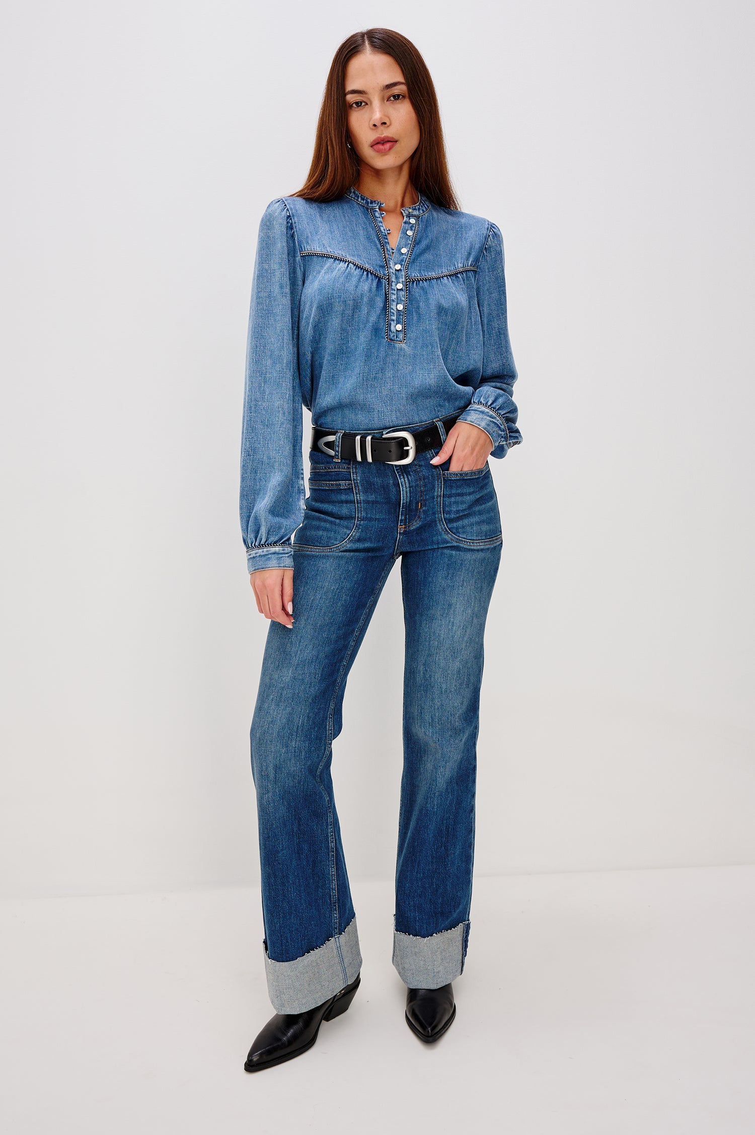 Sunna TENCEL™ Denim Shirt With Medium Wash, Front and Back Yoke Details, Half Front Placket With Shell Buttons, Two-Toned Twist Piping, and Long Sleeves With Shirred Shoulders and Fitted Cuffs in Blue Stone Colorway - Full Body Front View Featured on Model