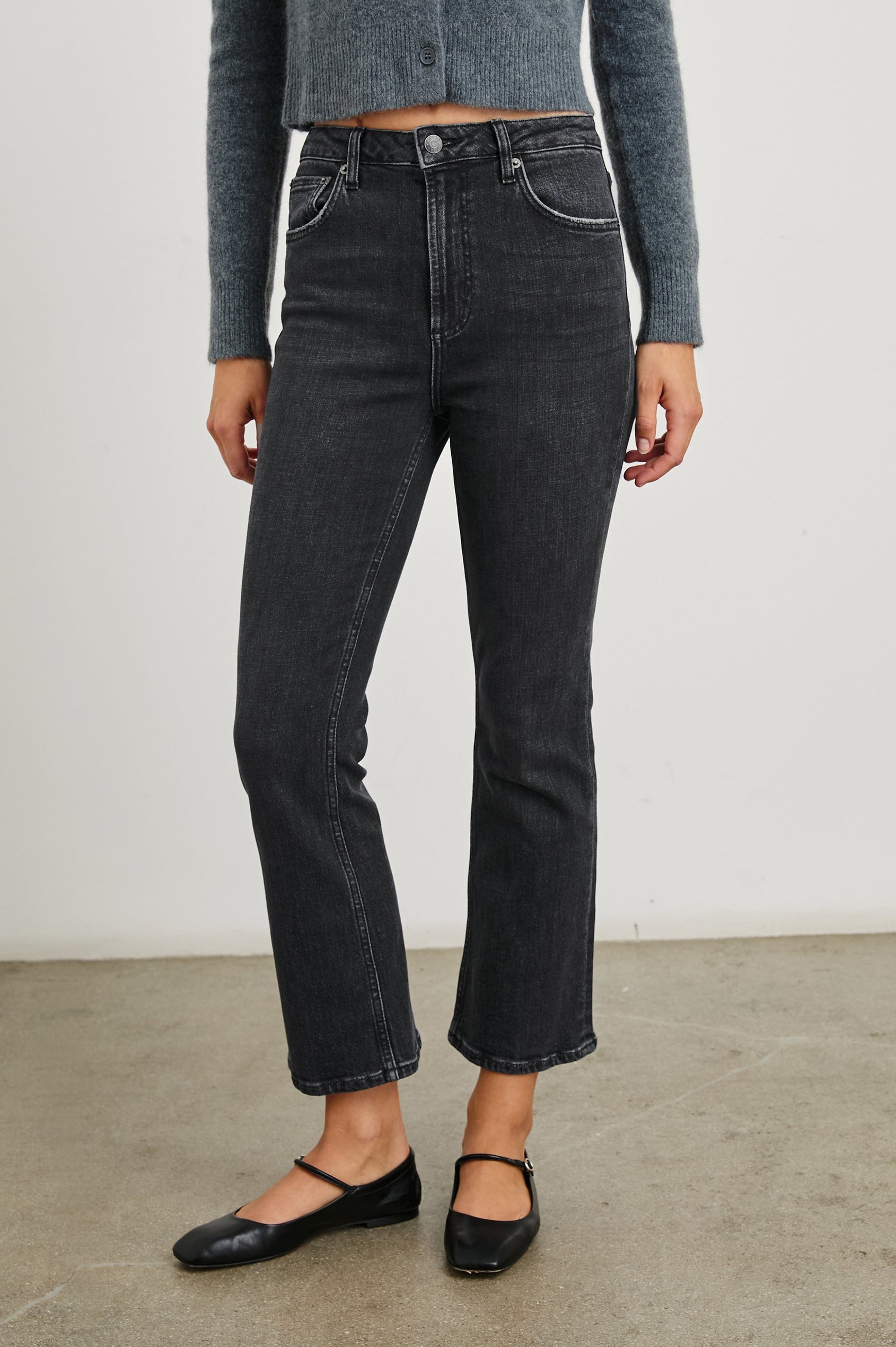 Sunset Crop Slim Fare Jeans with Belt Loops, Two Front Pockets plus a Coin Pocket and Two Back Patch Pockets in Black Pearl Colorway - Front View Featured on Model